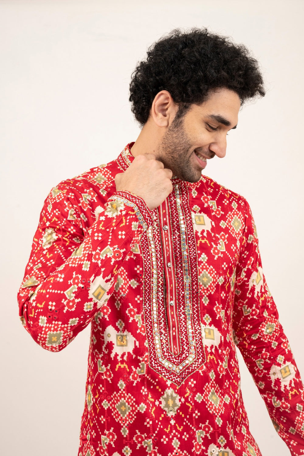 Bright red resham embroidered satin linen kurta set with kasab and mirror work