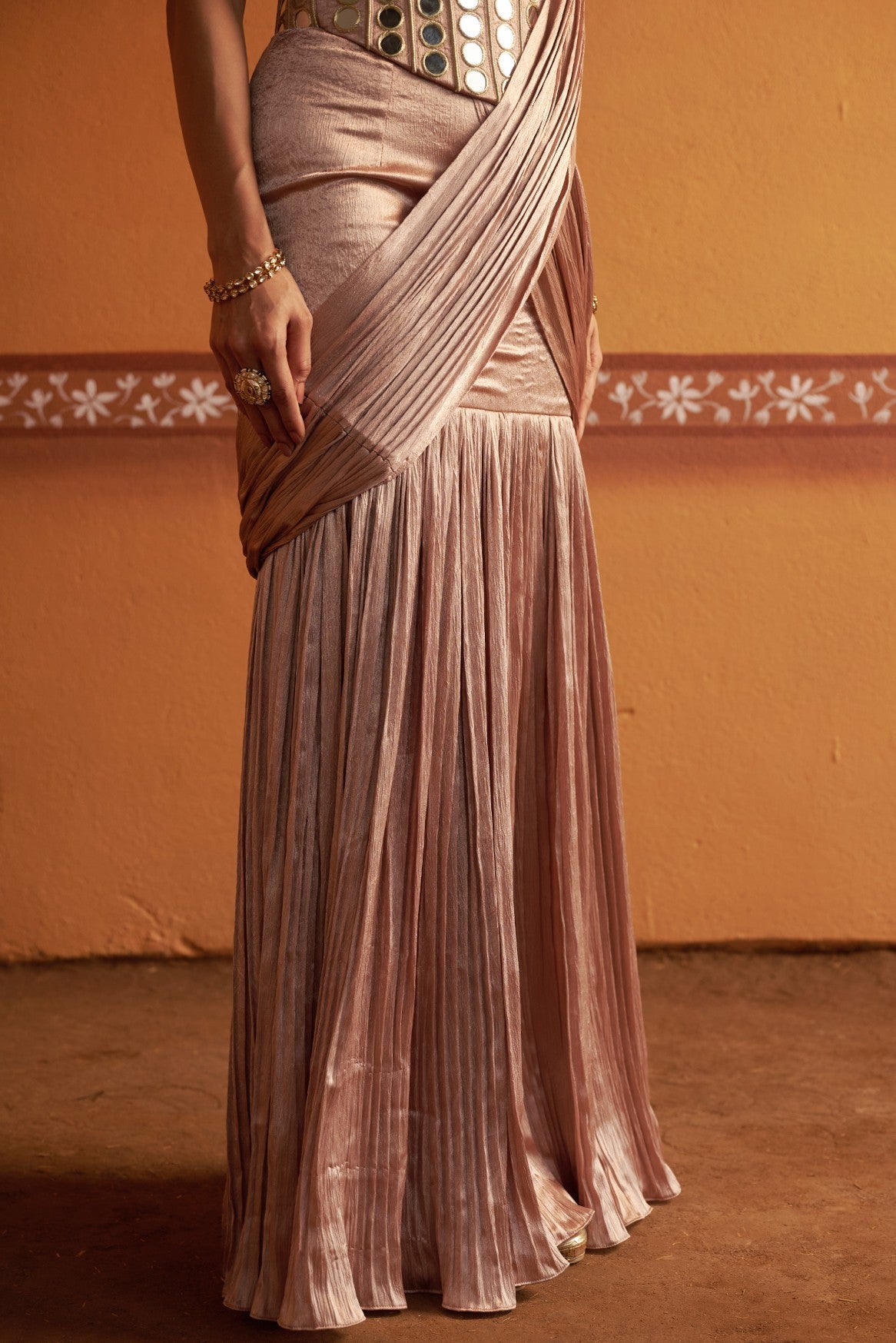 Hand embroidered corset with pleated pre draped saree