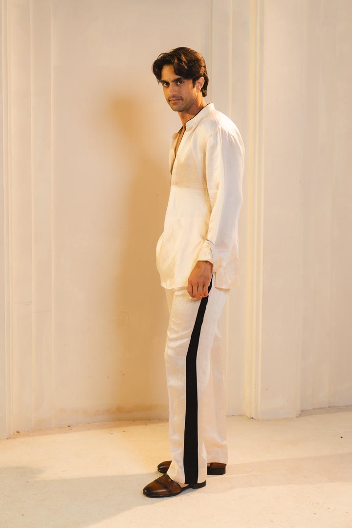 Concept blazer with hand paint and hand embroidery. paired with a matching kurta and trousers.