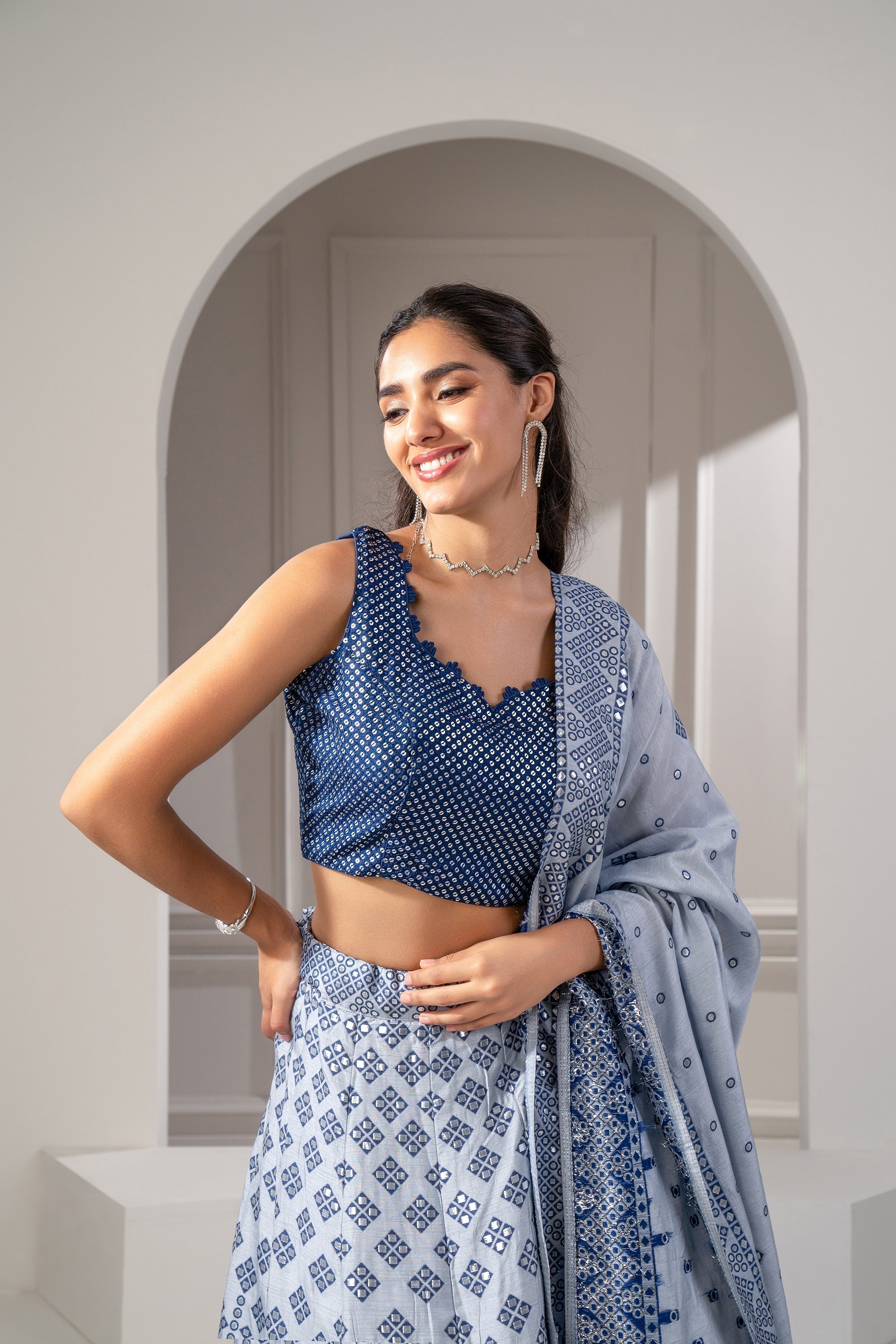 Silver Blue Soft Silk Lehenga Set With Mirror Embellishements.