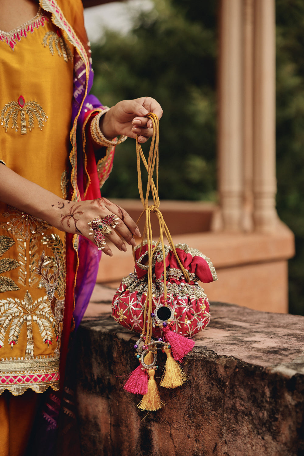 Rani Pink Zari Embroidered Potli Bag for Festive Weddings