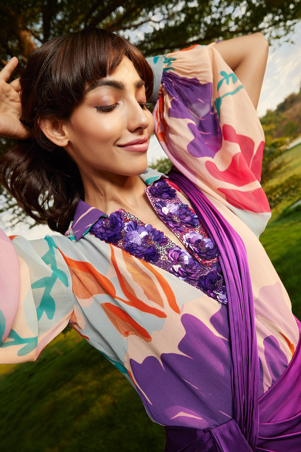 Floral printed top & Iris colored draped saree set.