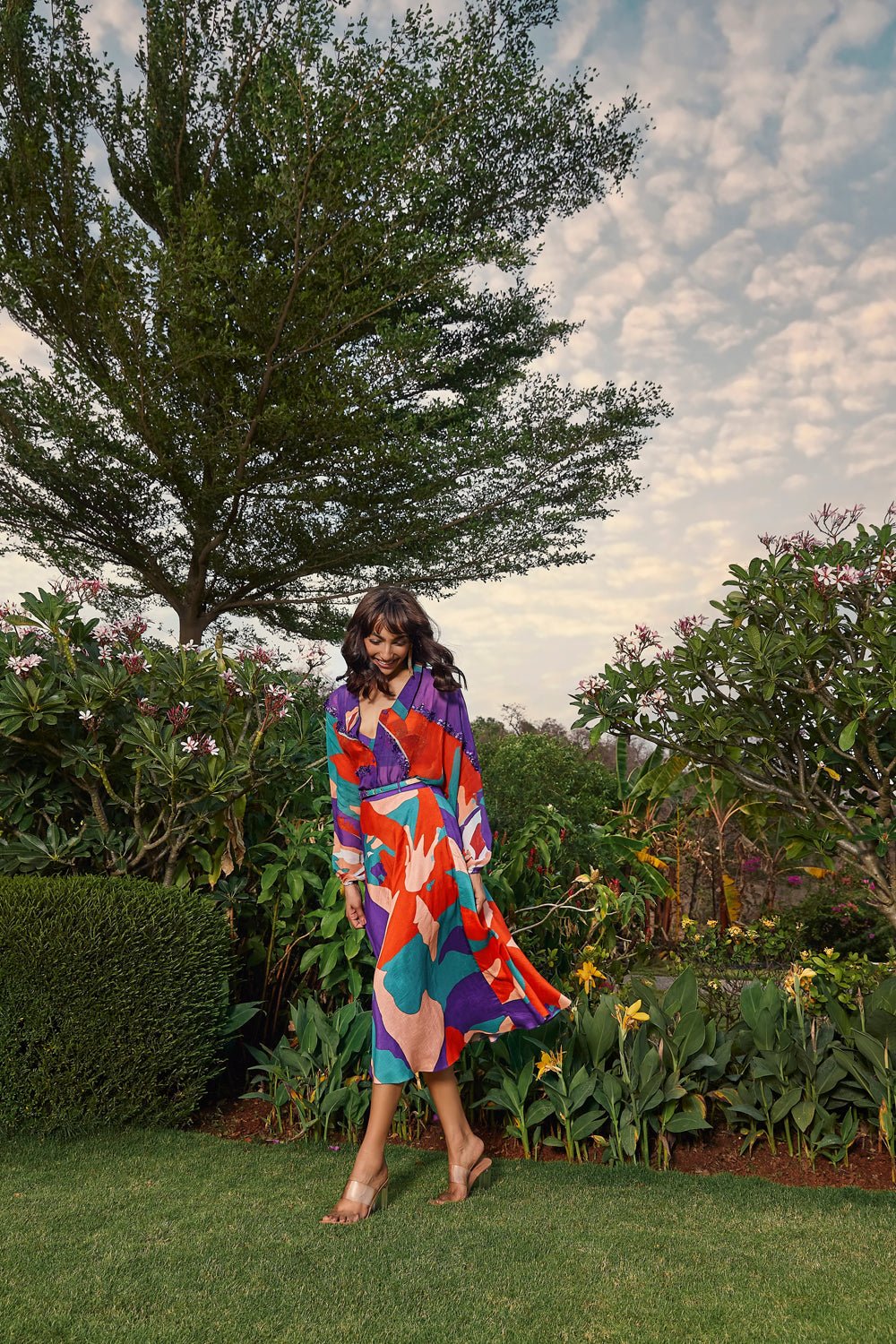 Printed Flared skirt paired with organza shirt.