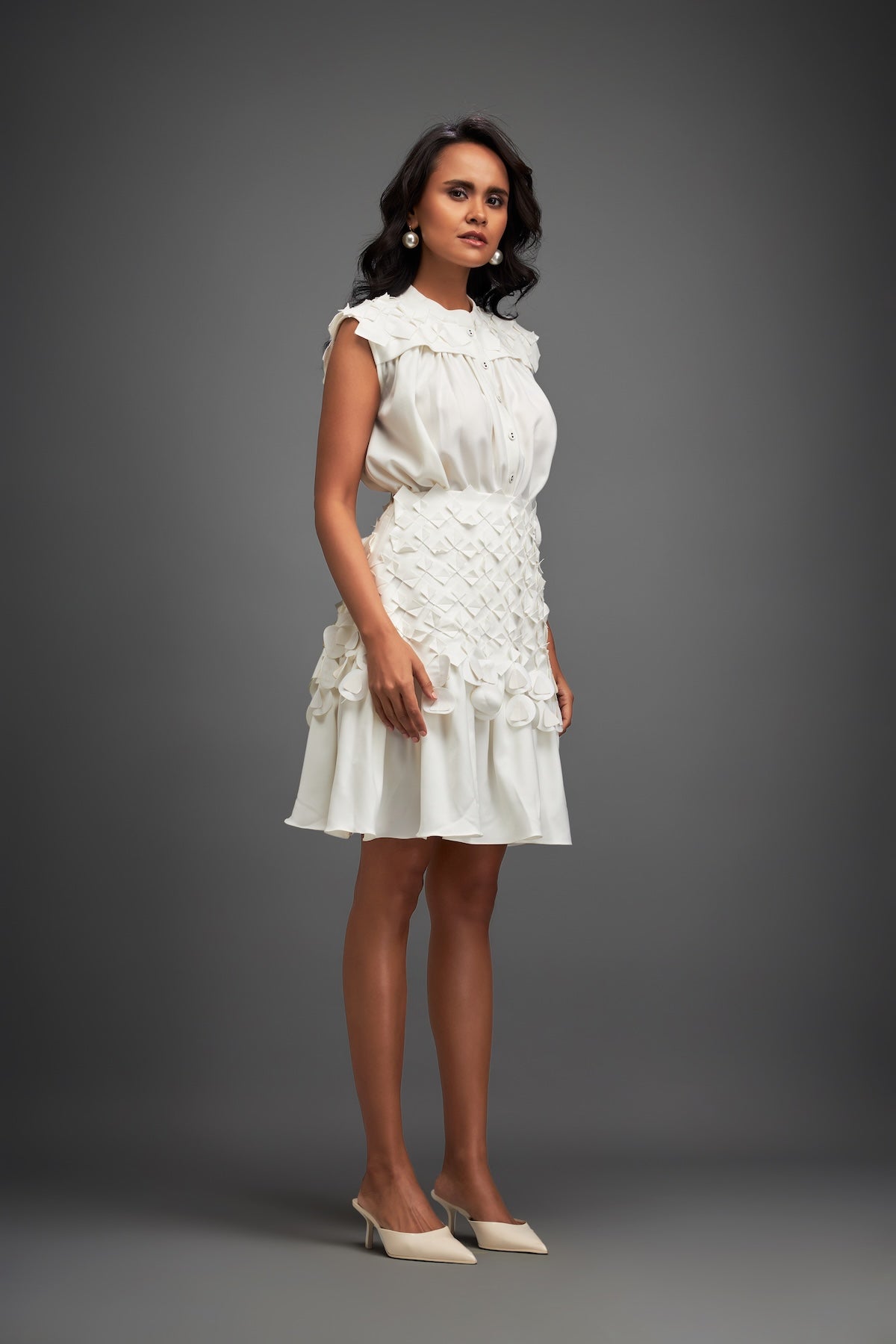 White Sleeveless Buttoned Top & Appliqué Skirt