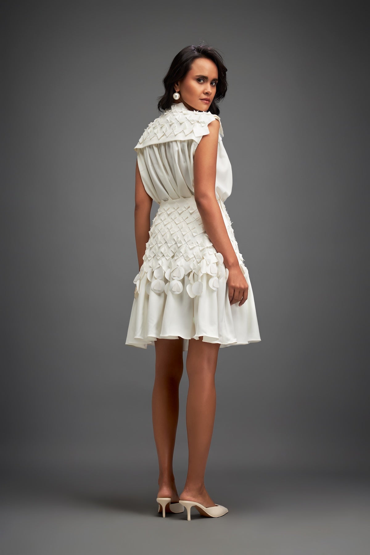 White Sleeveless Buttoned Top & Appliqué Skirt