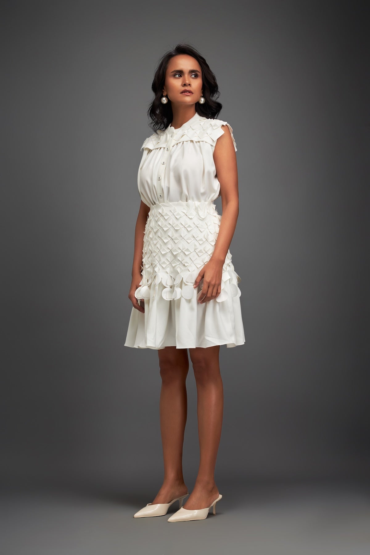 White Sleeveless Buttoned Top & Appliqué Skirt