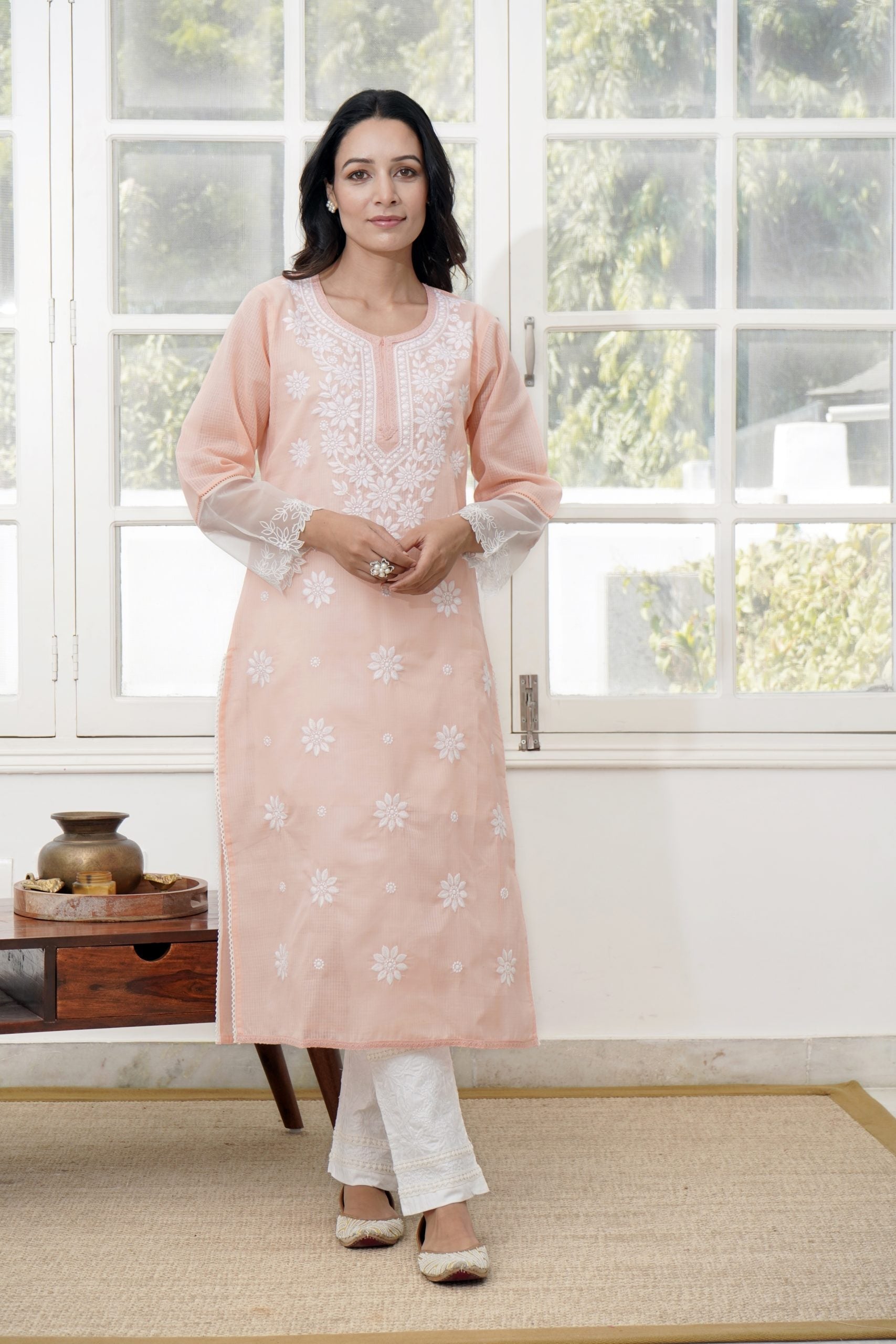 Image of Sophie Chikankari Kurta with floral embroidery and delicate lace detailing.