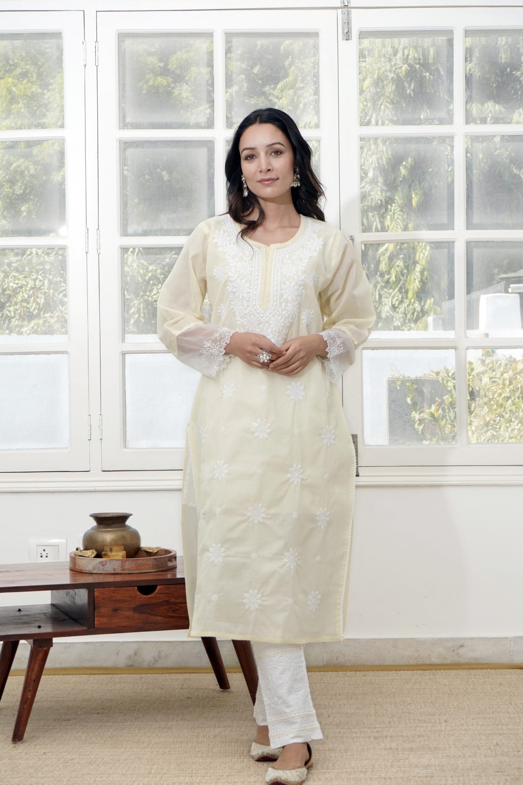 Image of Sunbeam Chikankari Kurta with floral embroidery and delicate lace detailing.