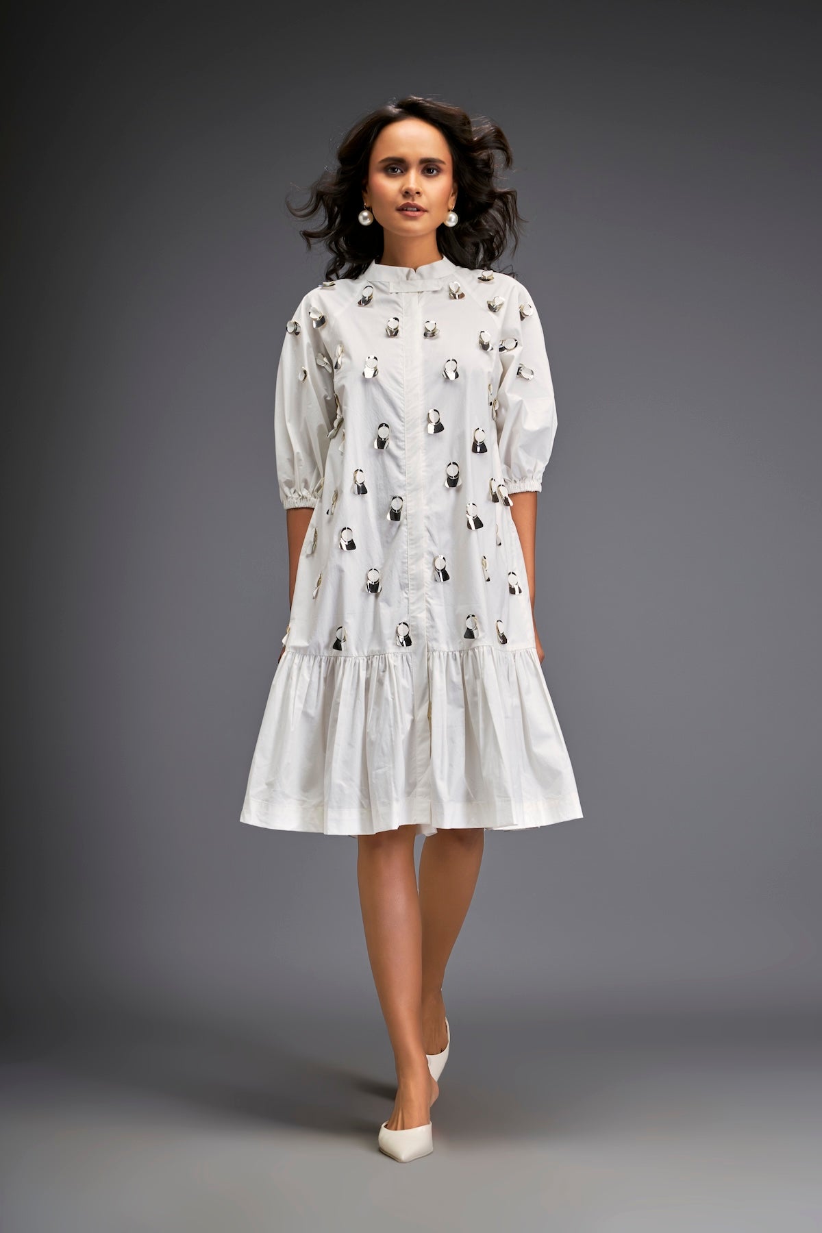 Dress With Puff Sleeves And Glossy Metallic Discs And A Ruffled Hemline