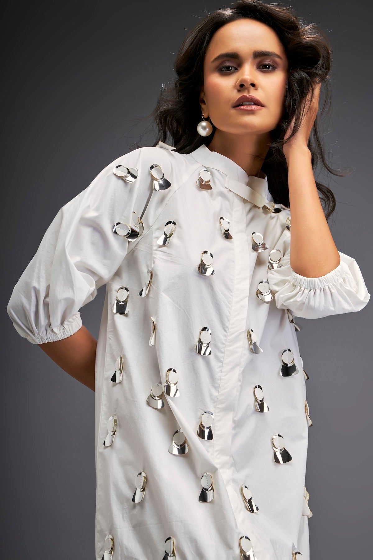 Dress With Puff Sleeves And Glossy Metallic Discs And A Ruffled Hemline