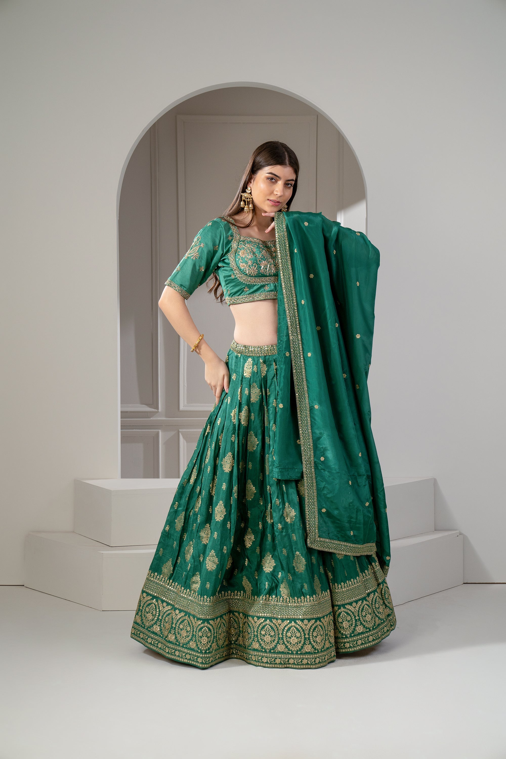 Emerald Green Soft Silk Sequins and Zari Embroidered Lehenga Set.