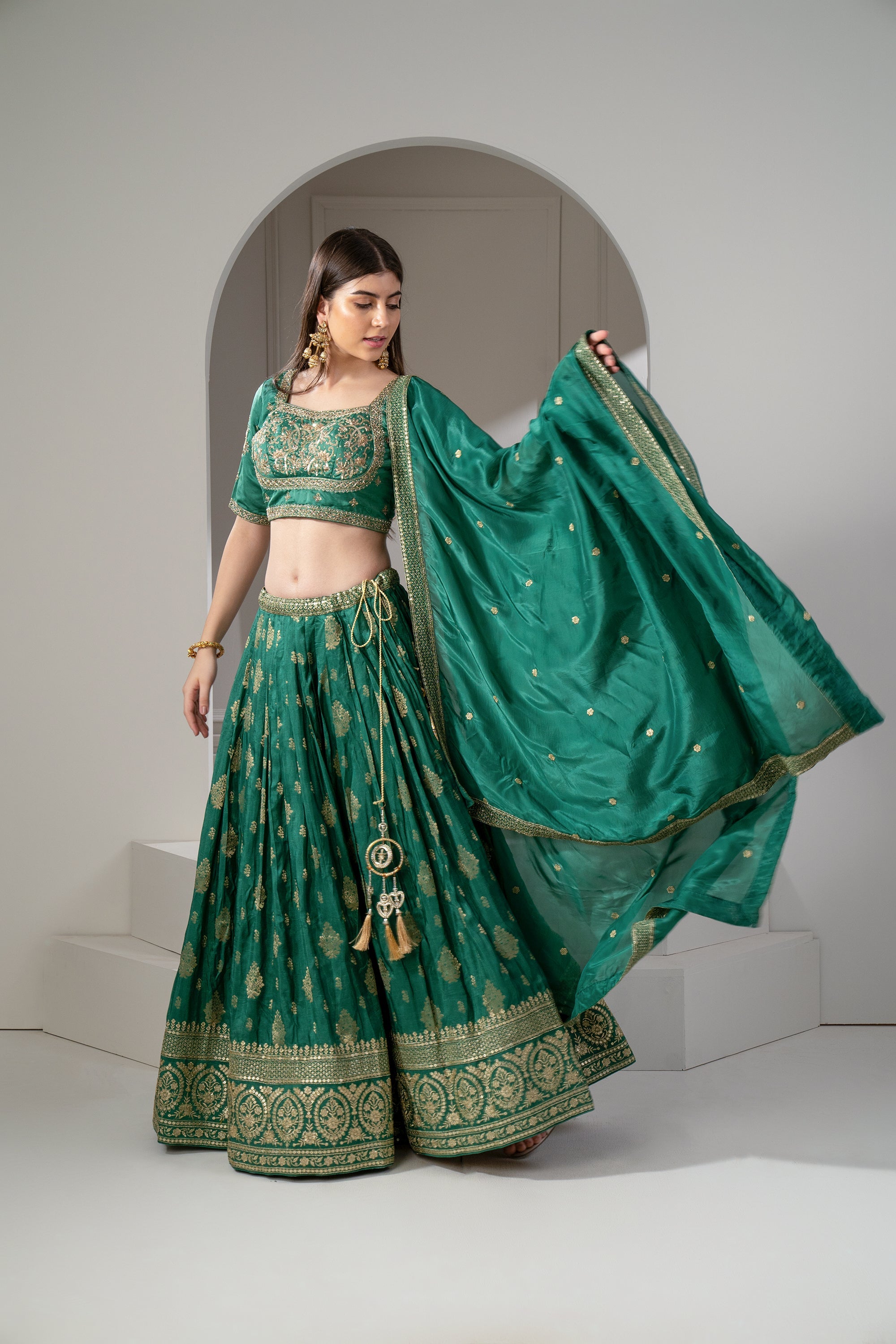 Emerald Green Soft Silk Sequins and Zari Embroidered Lehenga Set.