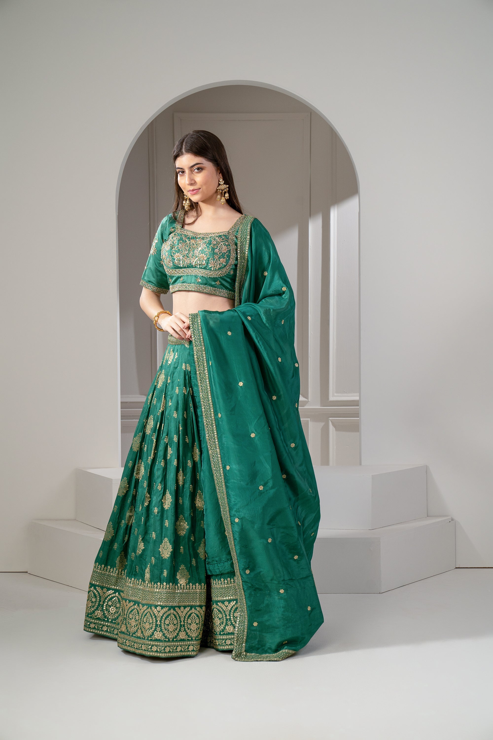 Emerald Green Soft Silk Sequins and Zari Embroidered Lehenga Set.