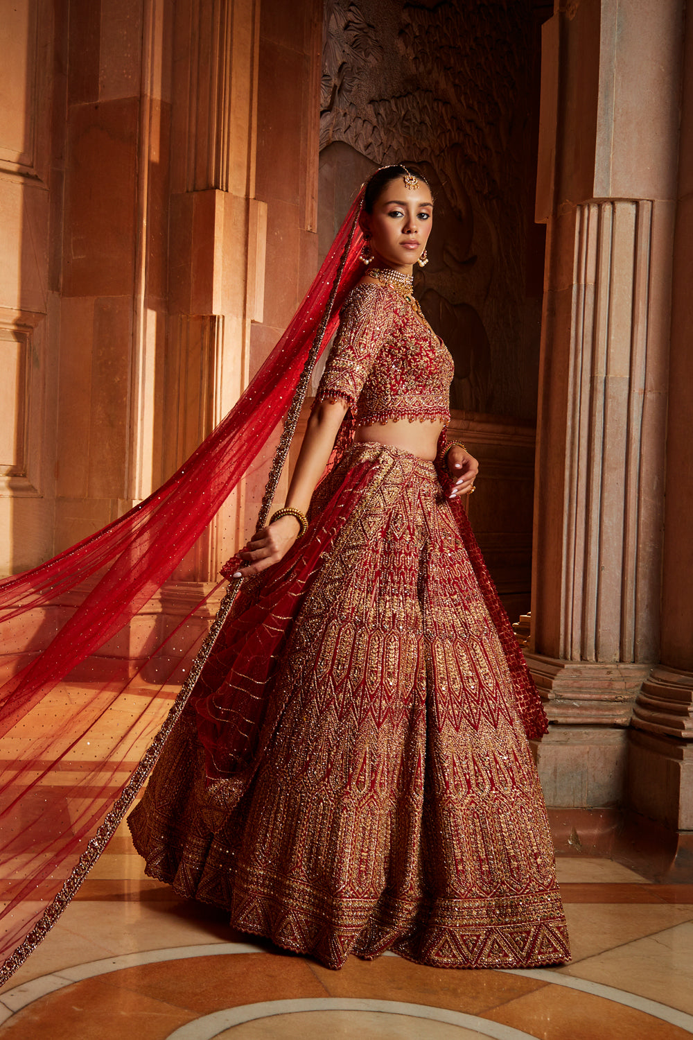 Deep Red Raw Silk Bridal Lehenga with Antique Zari & Dabka