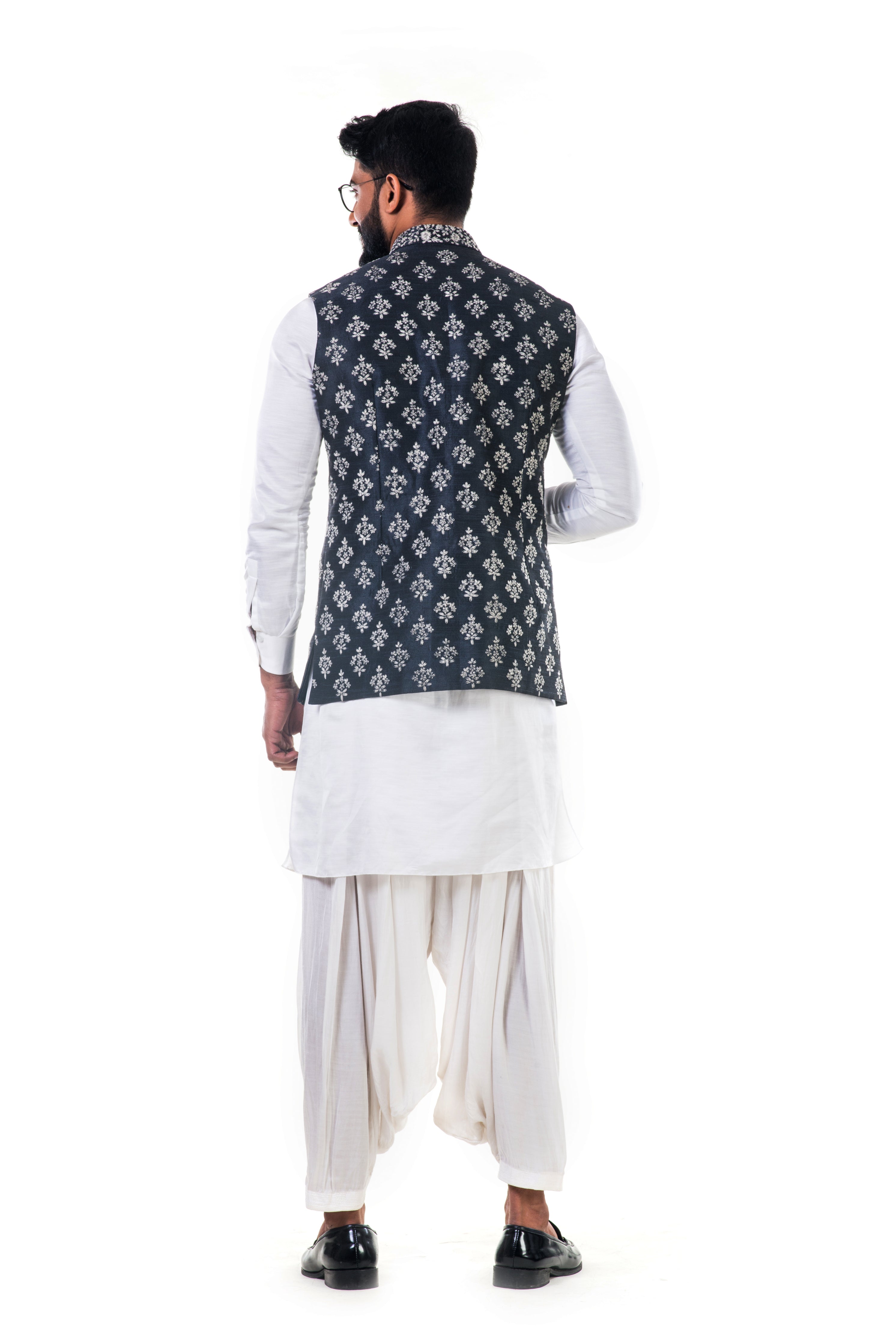 White Linen Satin Kurta Set With a  Black Silk Nehru Jacket With White Cord Floral Embroidery