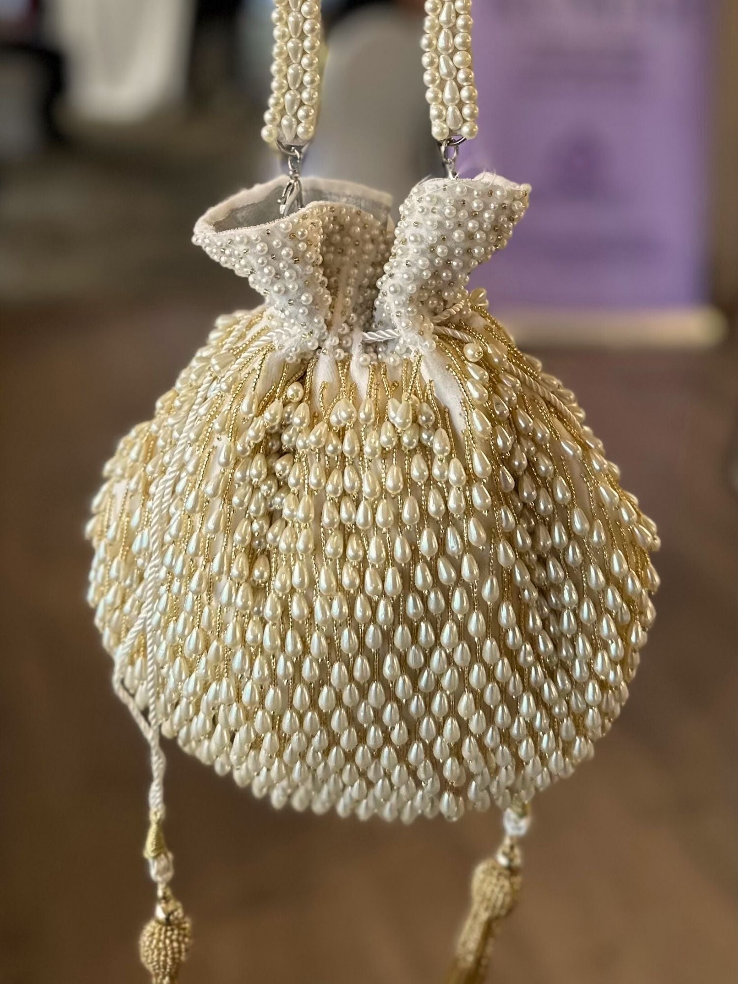 Adara Ivory Suede Potli With Pearl Gold Hanging