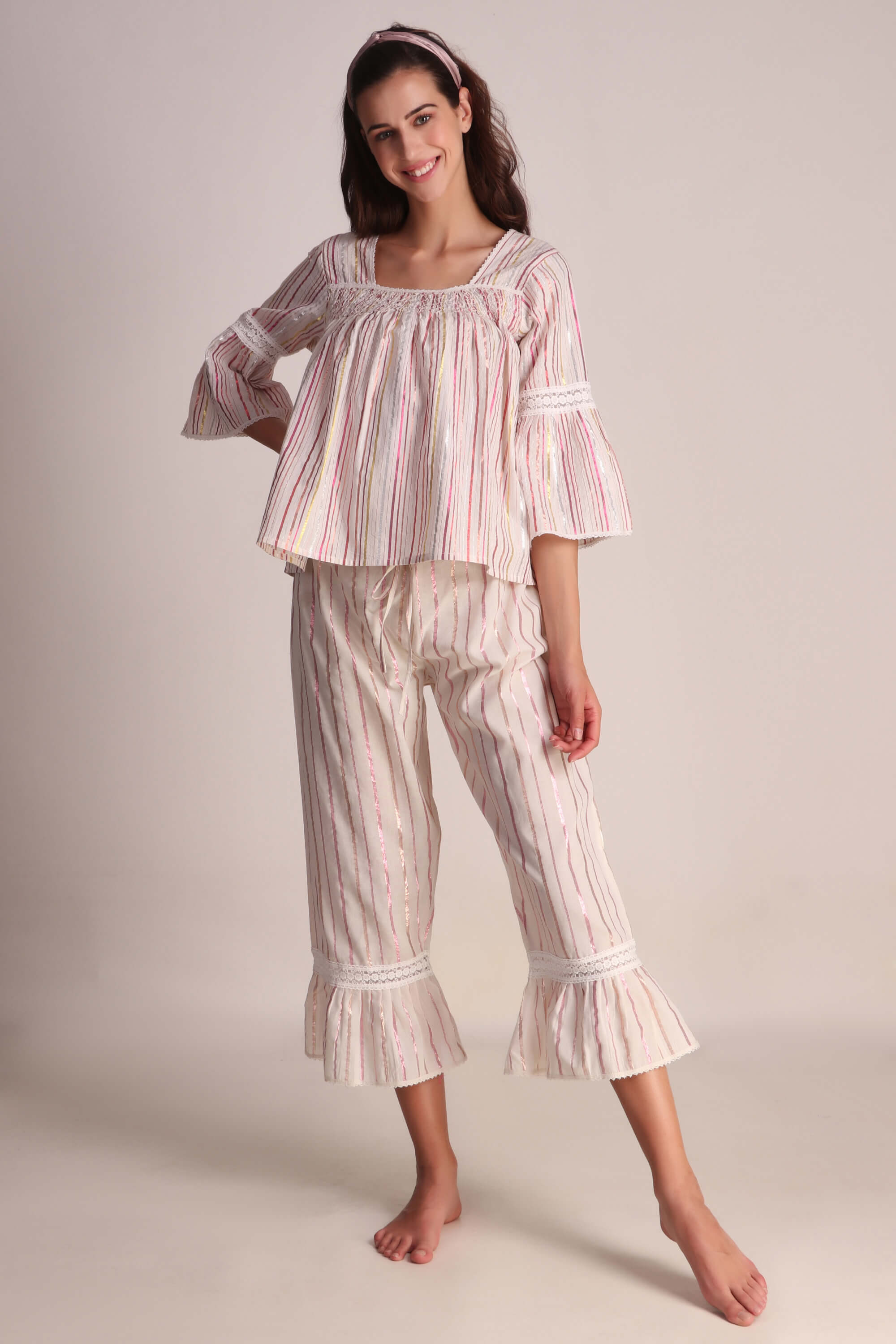 Stylish Opal Pyjama Suit with flared sleeves and ruffled hem.