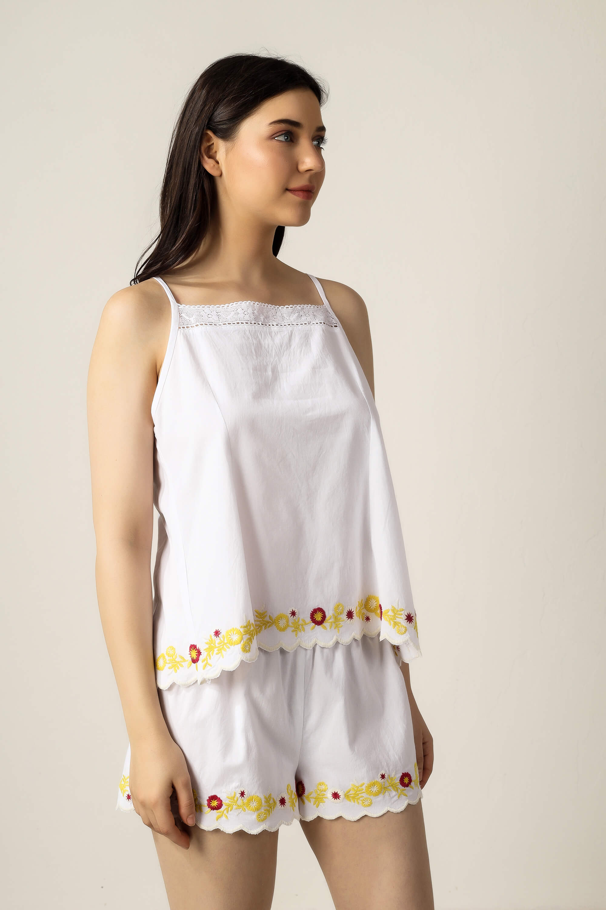 Gwen shorts and camisole set with floral embroidery in white.