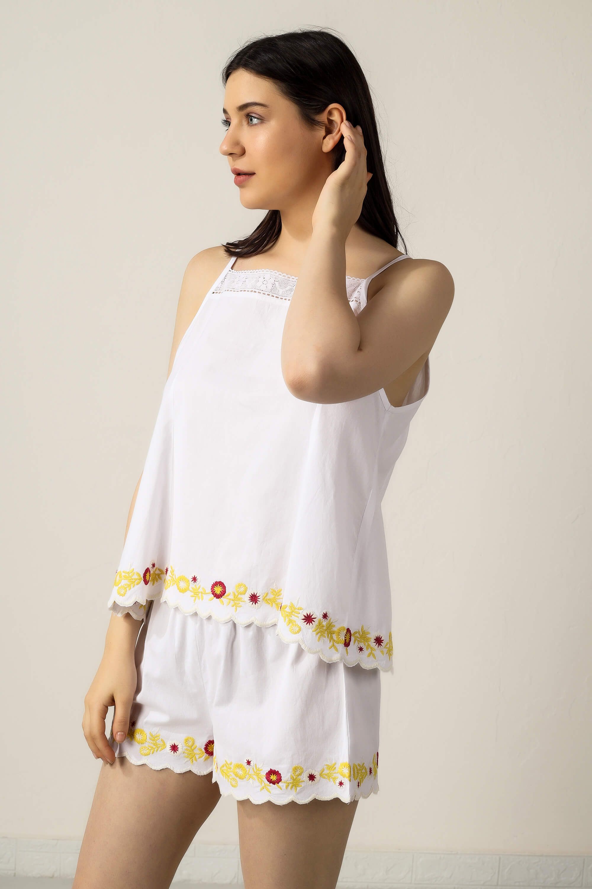 Gwen shorts and camisole set in white with colorful embroidery.