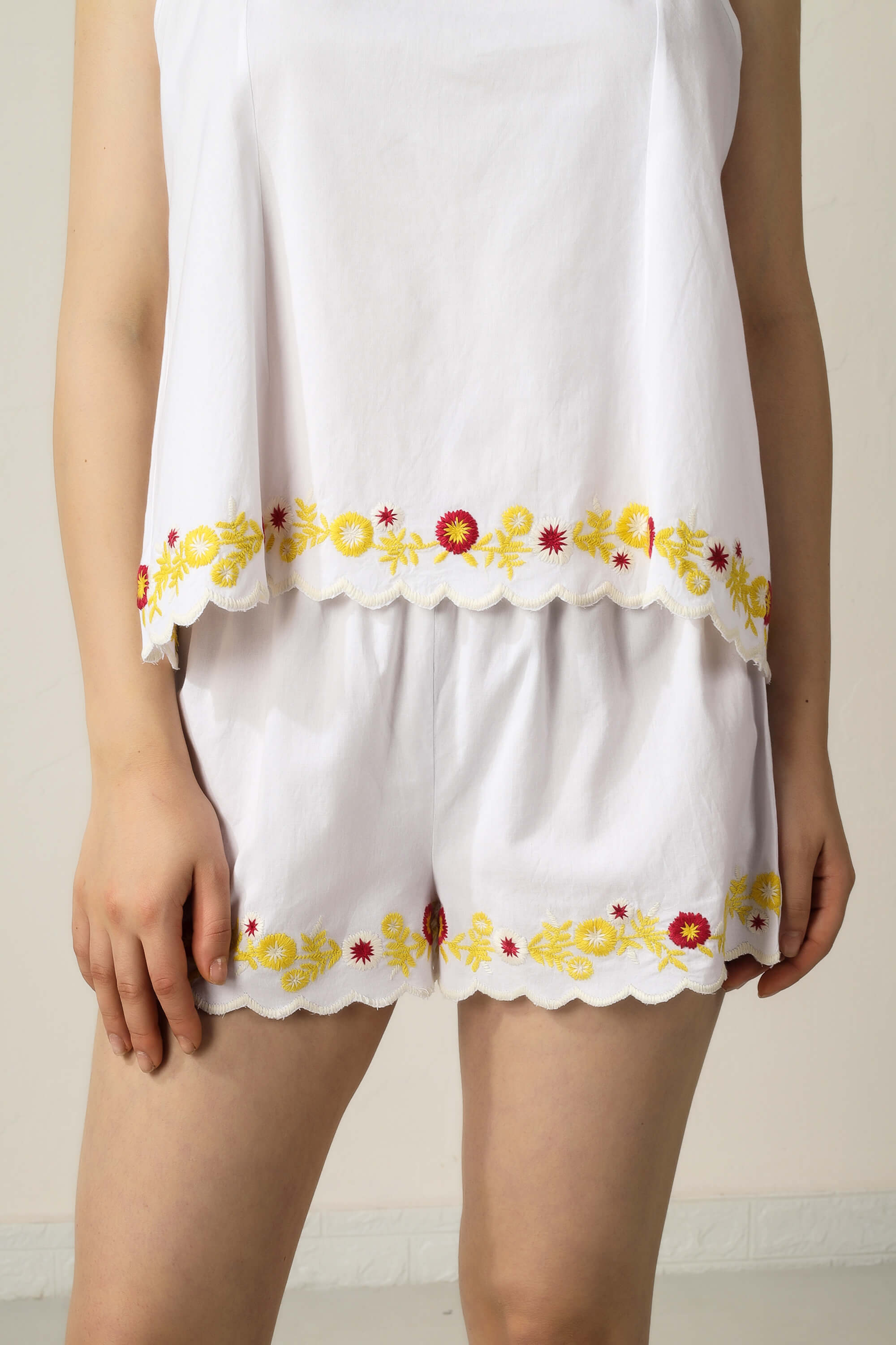 Gwen embroidered shorts and camisole set for stylish comfort.