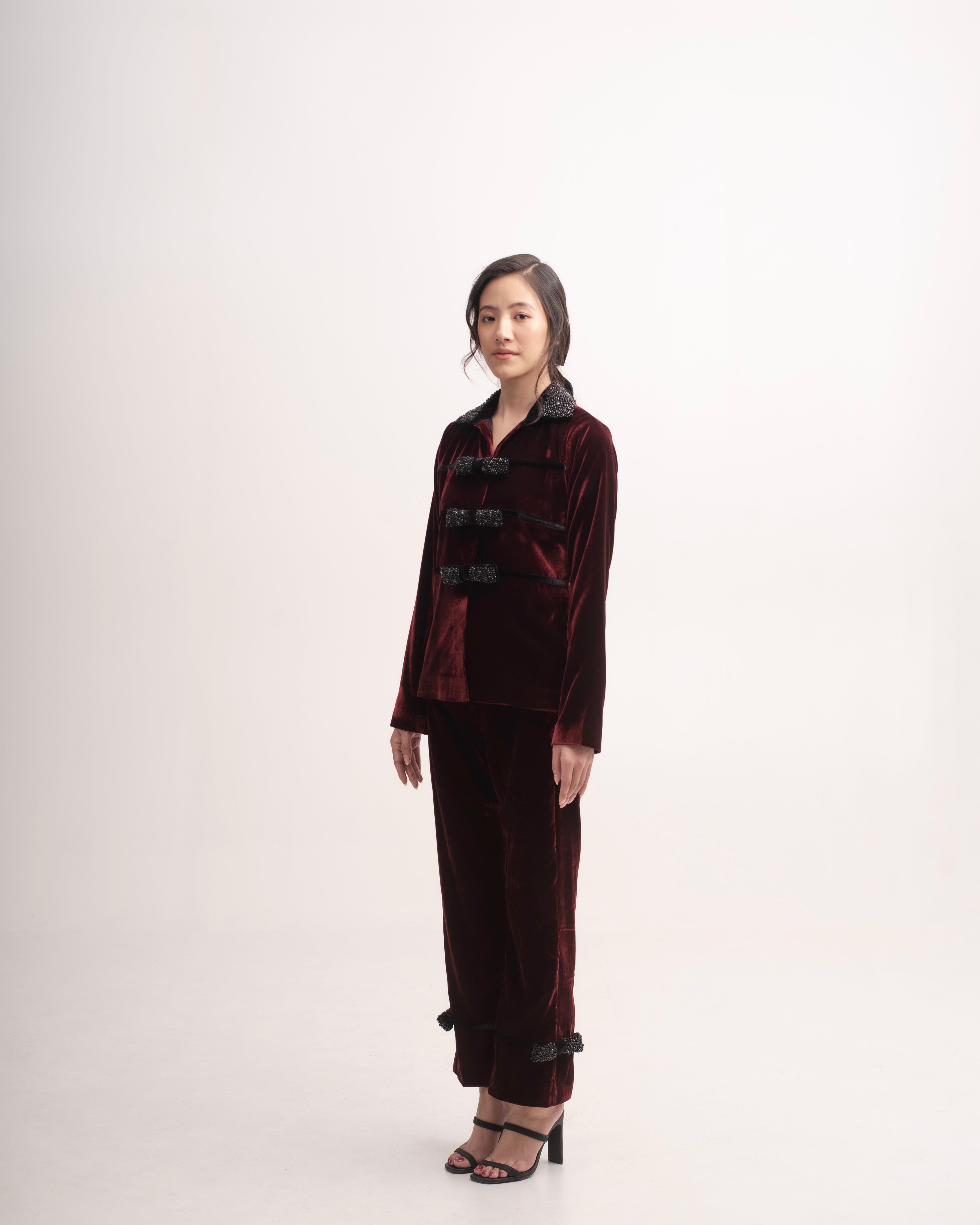 Silk-velvet high-waisted trousers with embellished bows