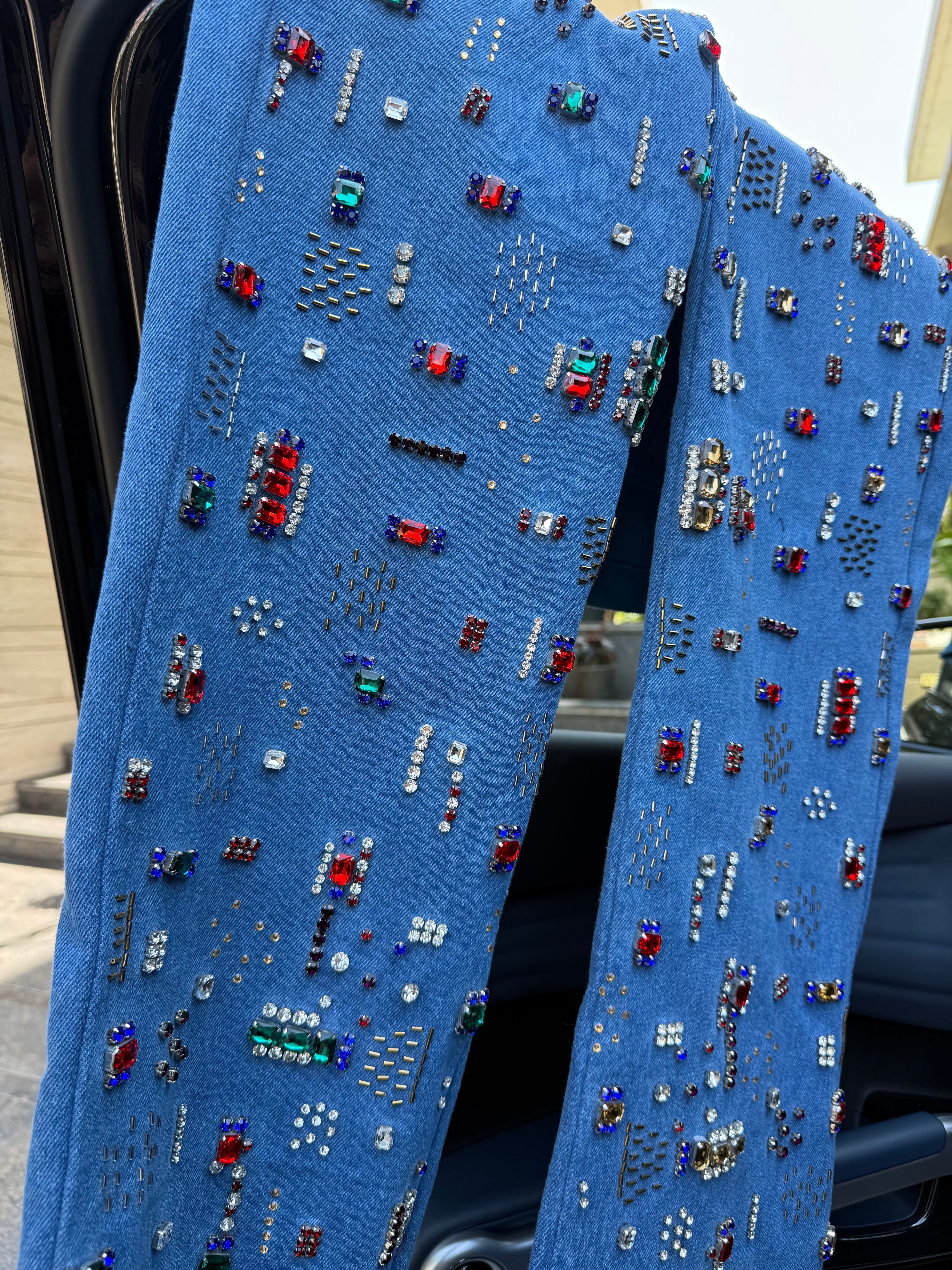 High-waisted multi-embellished denim jeans