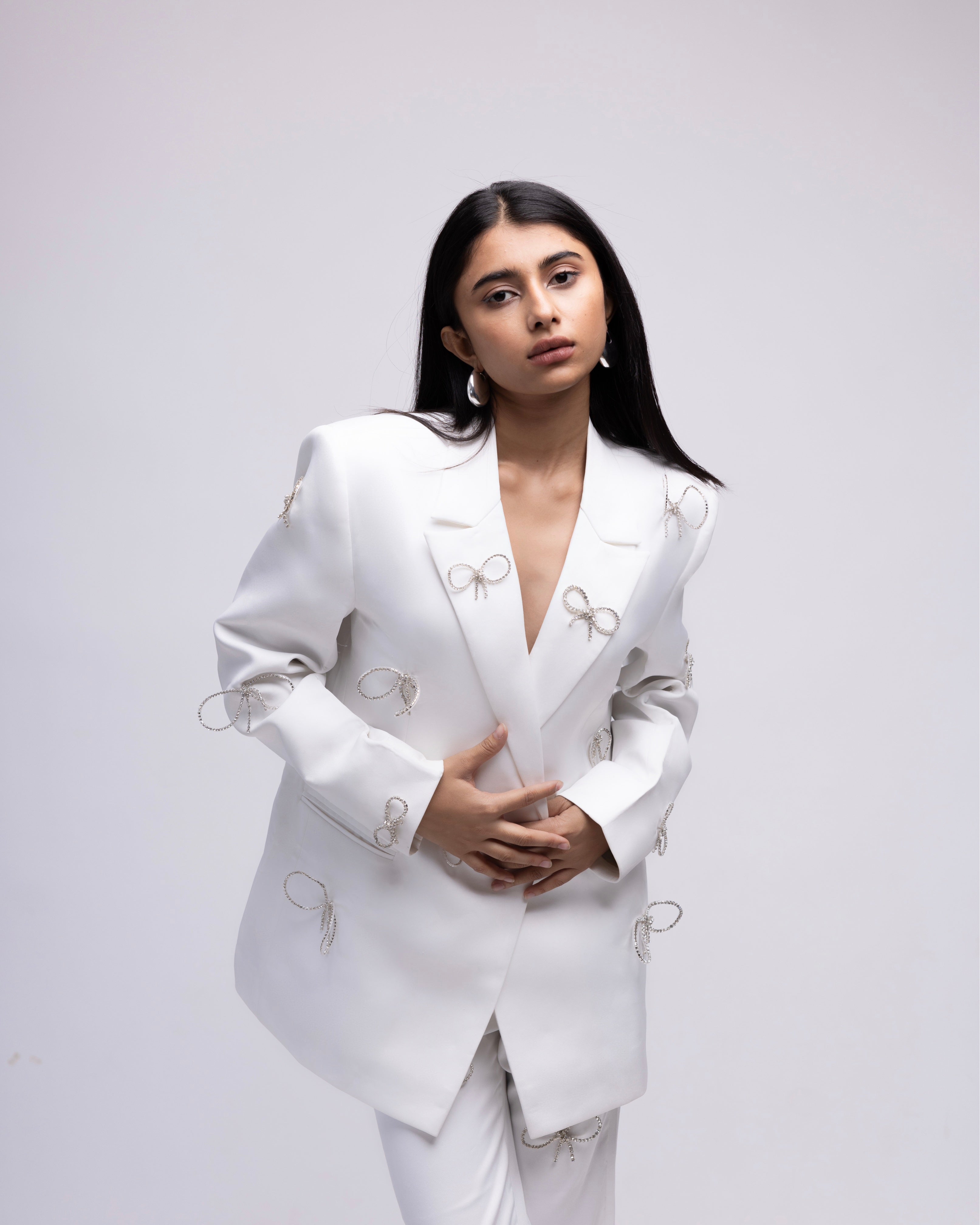 High-waisted ankle length trousers with rhinestone bows LIMITED EDITION