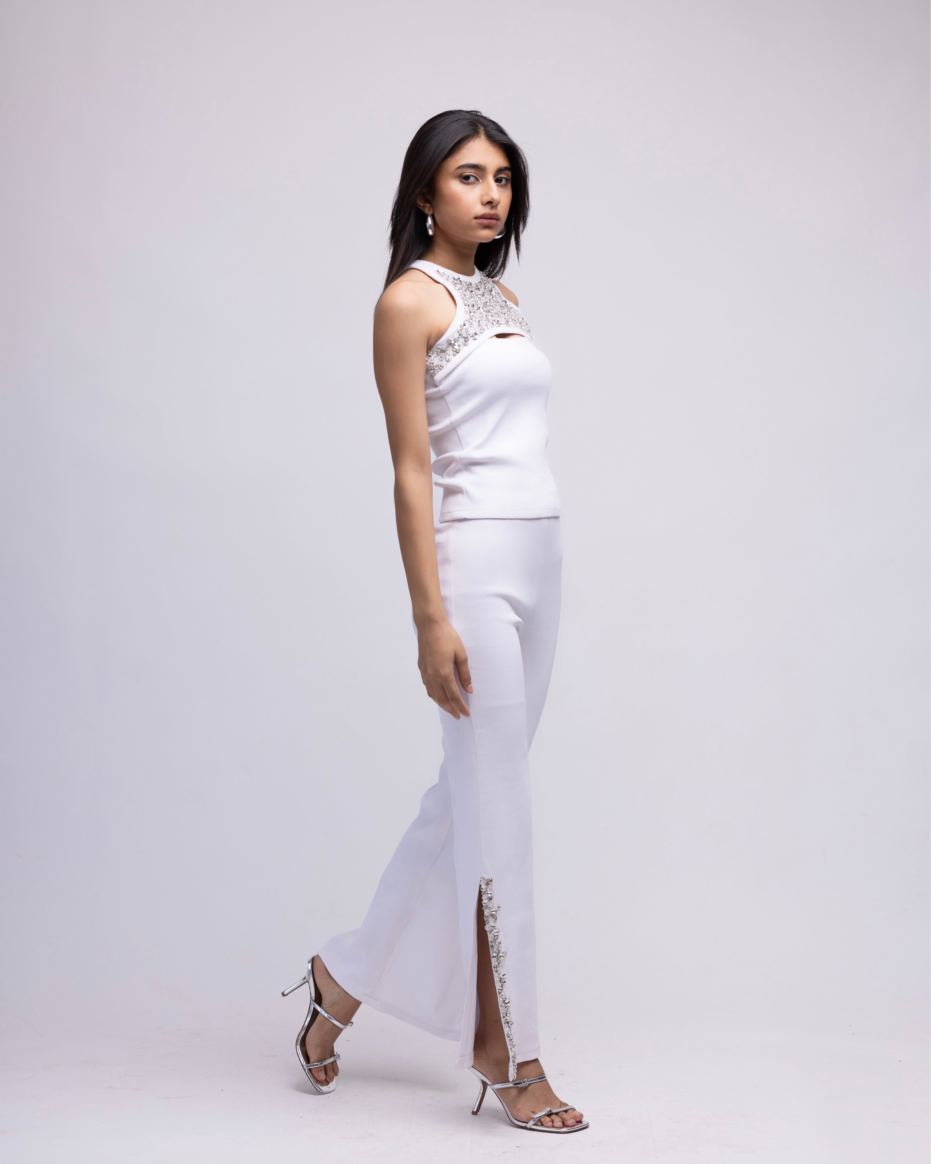 Ribbed side slit trousers with embellishments