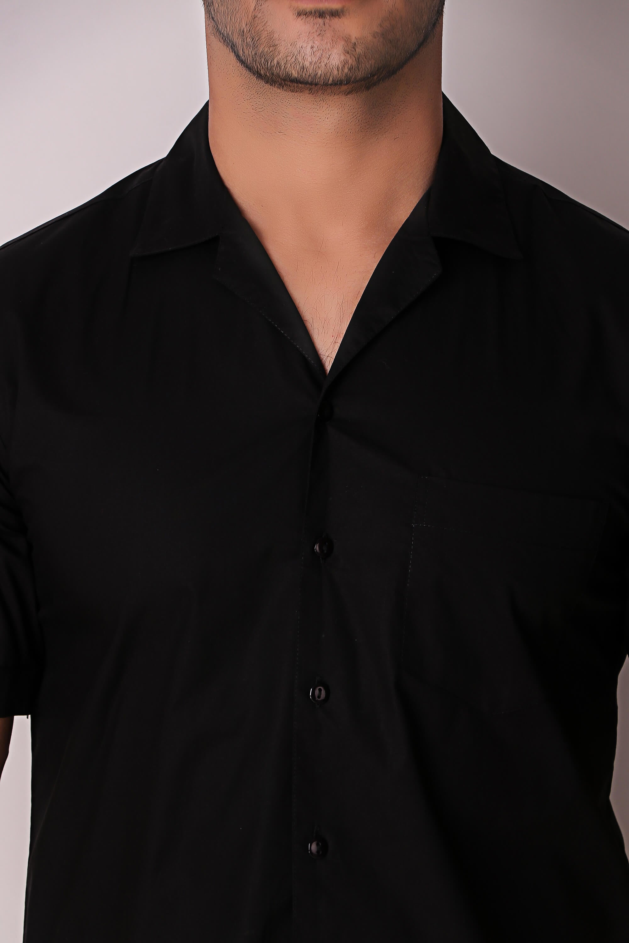 Men's black button-up shirt from the Opal shorts set.