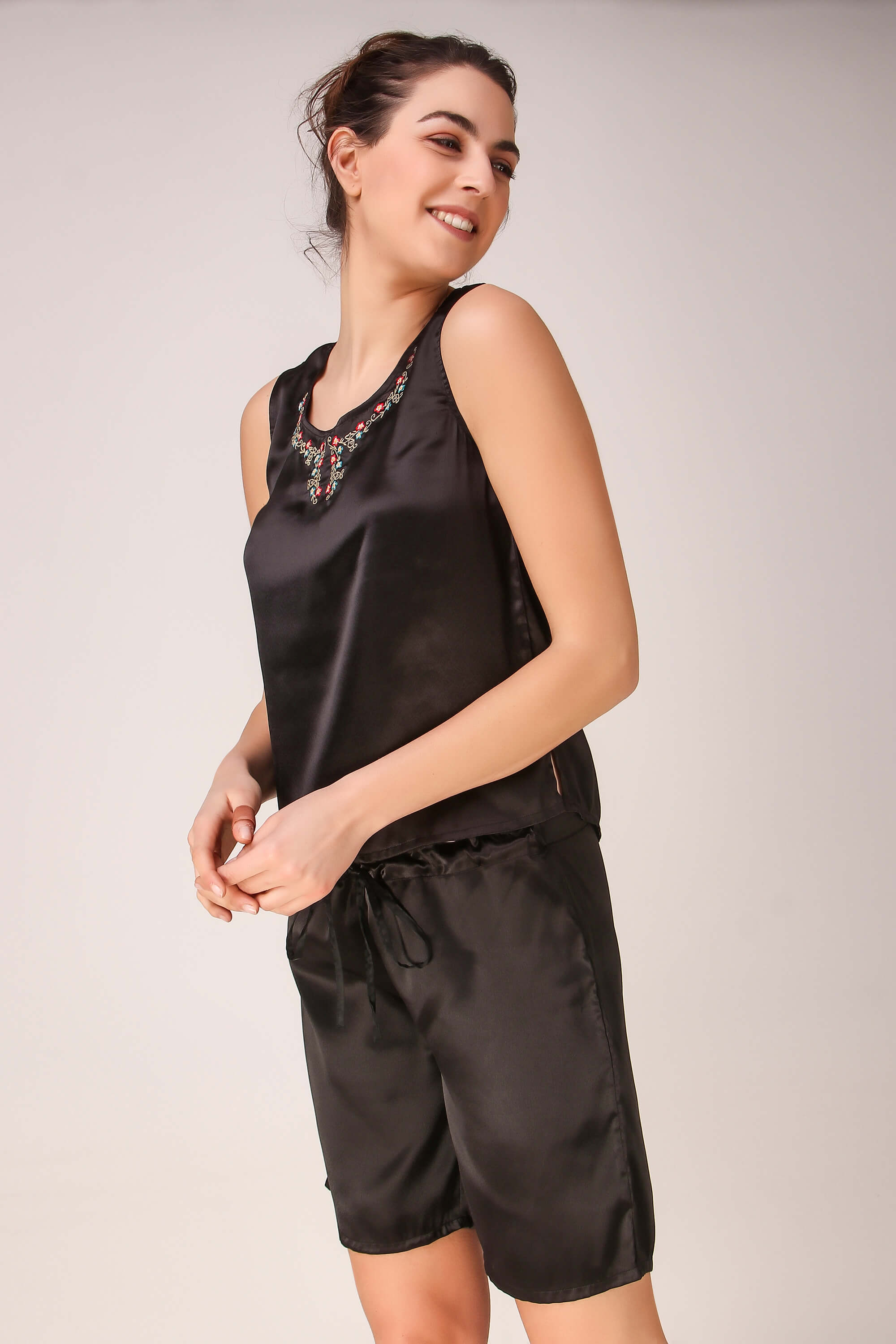 Black satin Maya shorts set for stylish comfort.