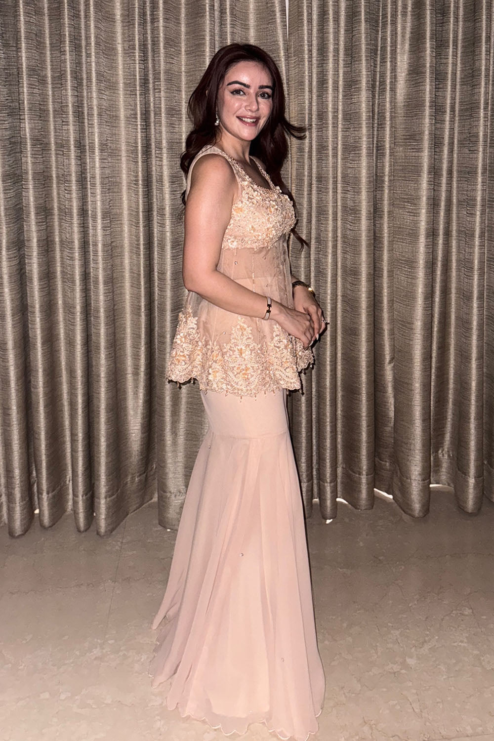 Soorat Peach Peplum Short Kurta with Flowy Georgette Sharara