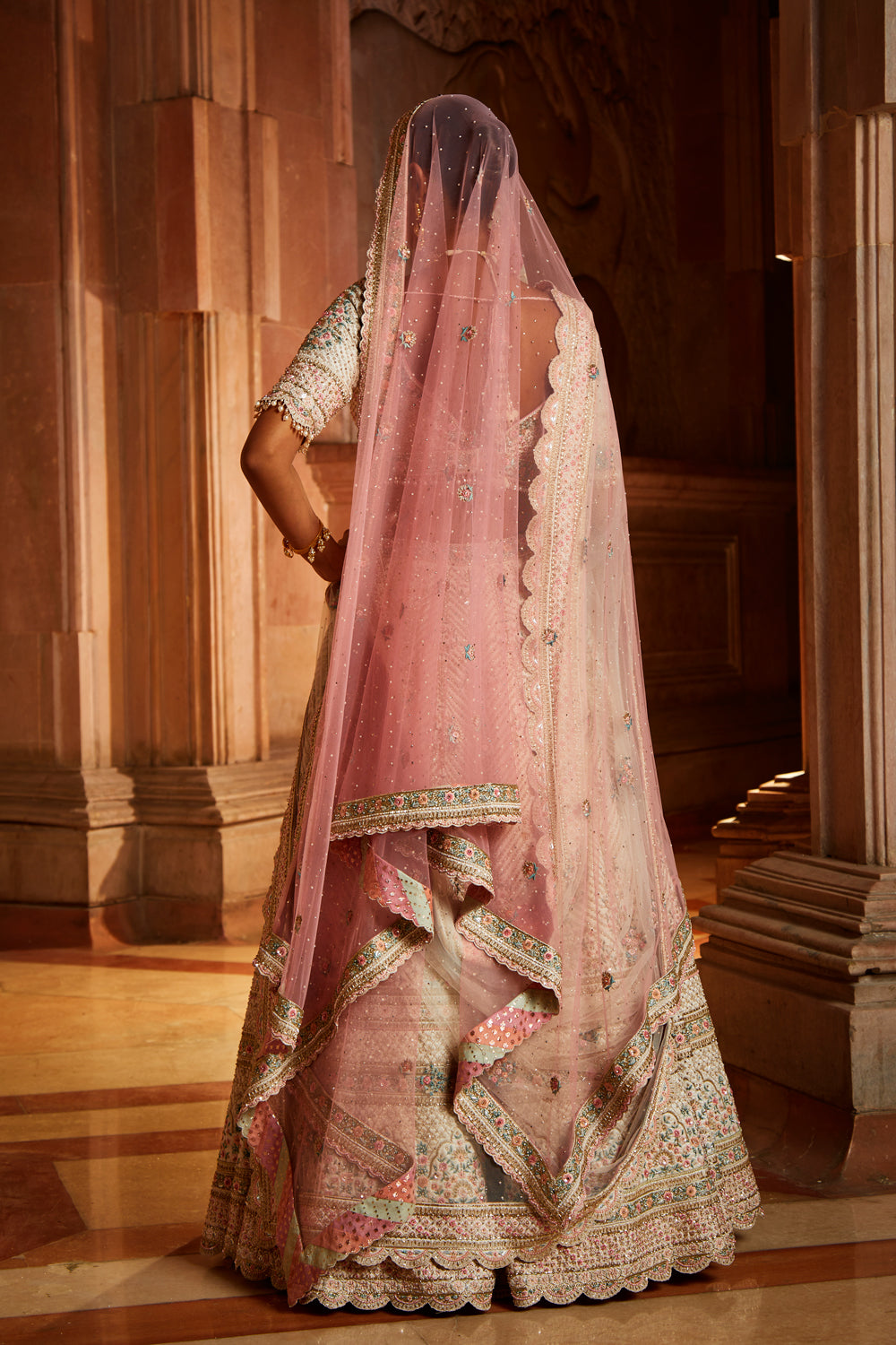 Ivory Tafetta Lehenga Choli with Pastel Gold Embroidery
