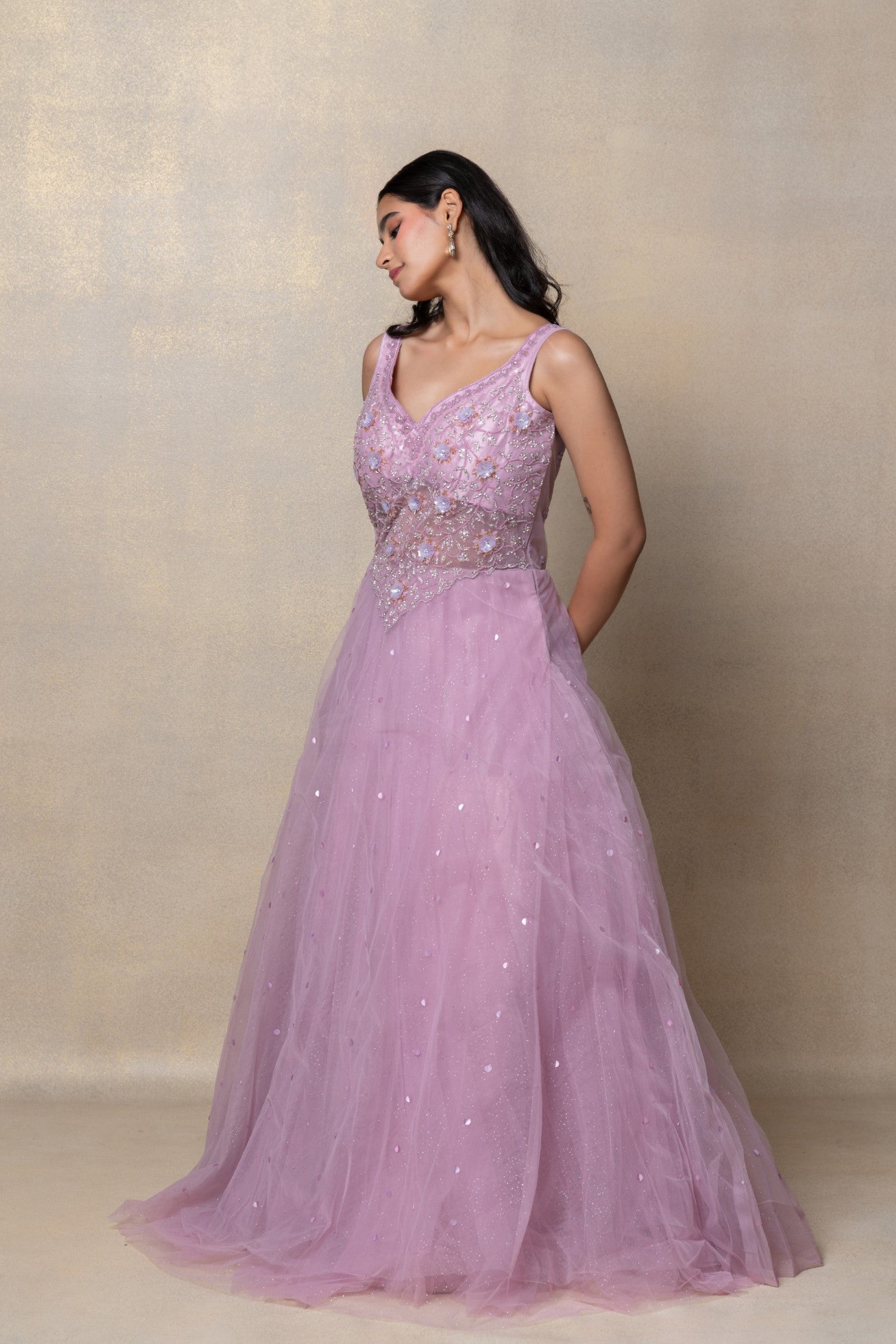 Bright lilac sequinned net gown