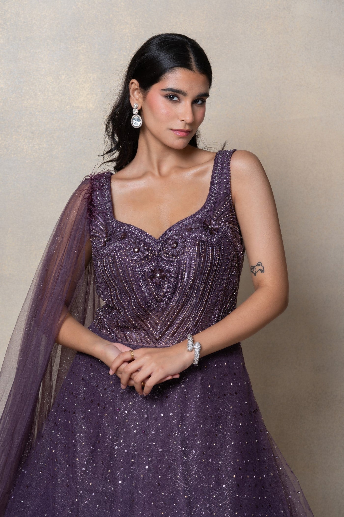 Violet purple sequinned net gown