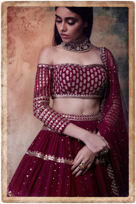 Image of Wine off shoulder tier lehenga set