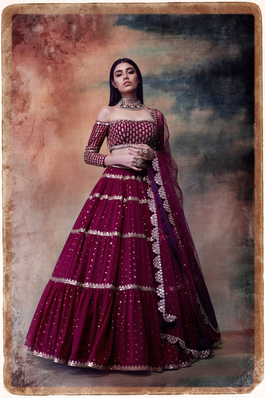 Image of Wine off shoulder tier lehenga set