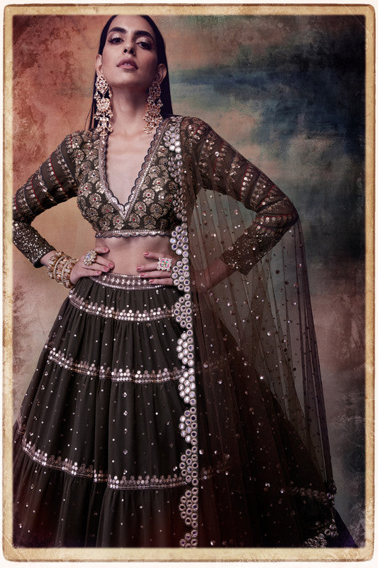 Image of Olive green tier lehenga set