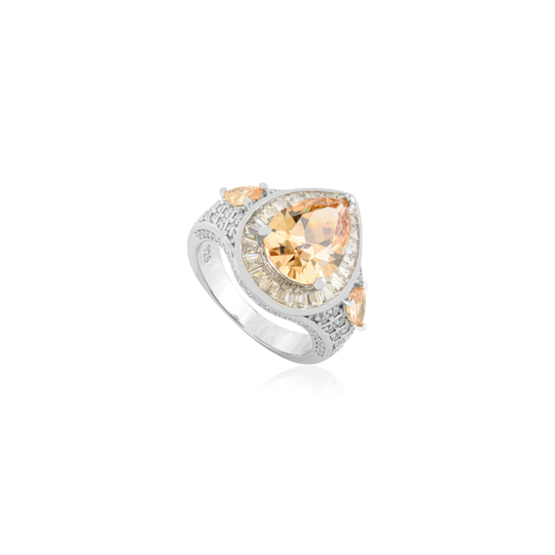 Opulent Silver Ring with Bold Pear Citrine and CZ Baguettes