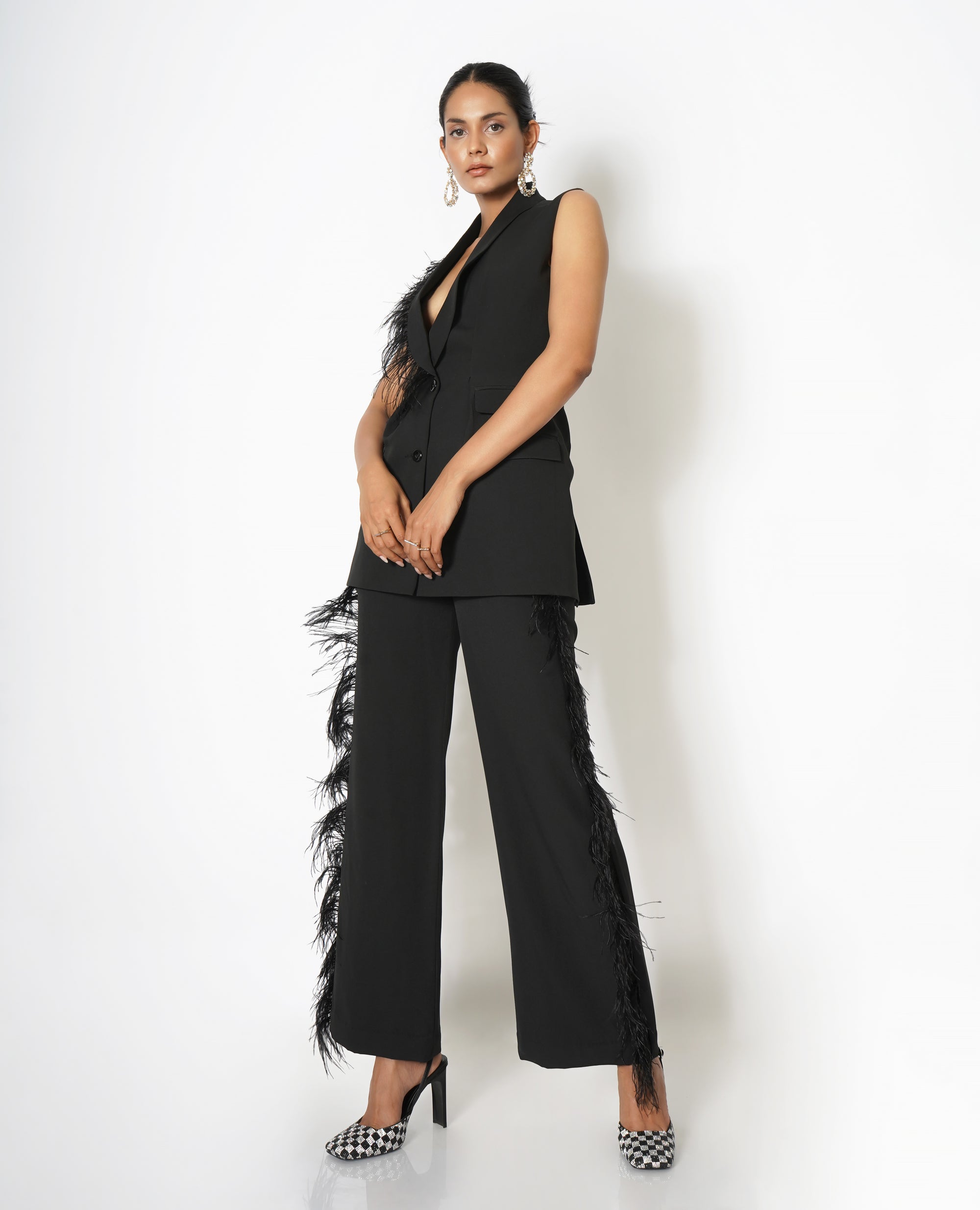 High-waisted trousers with feather detail