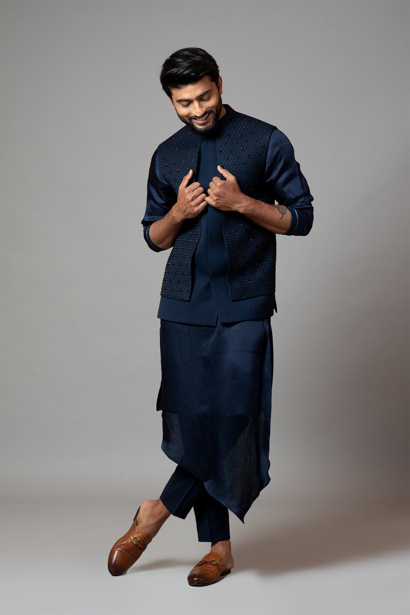 Navy blue Nehru jacket with Honeycomb pattern embroidery highlighted with panel detailing.