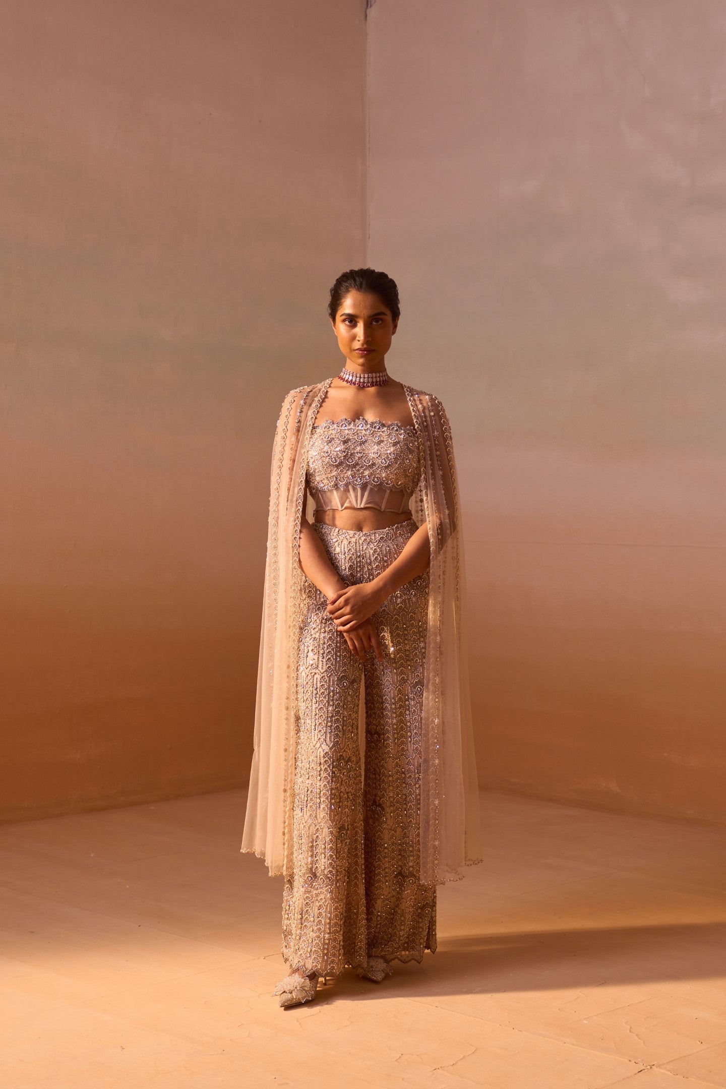 Nude Peach Net Palazzo Set with Pearl Corset and Embroidered Cape