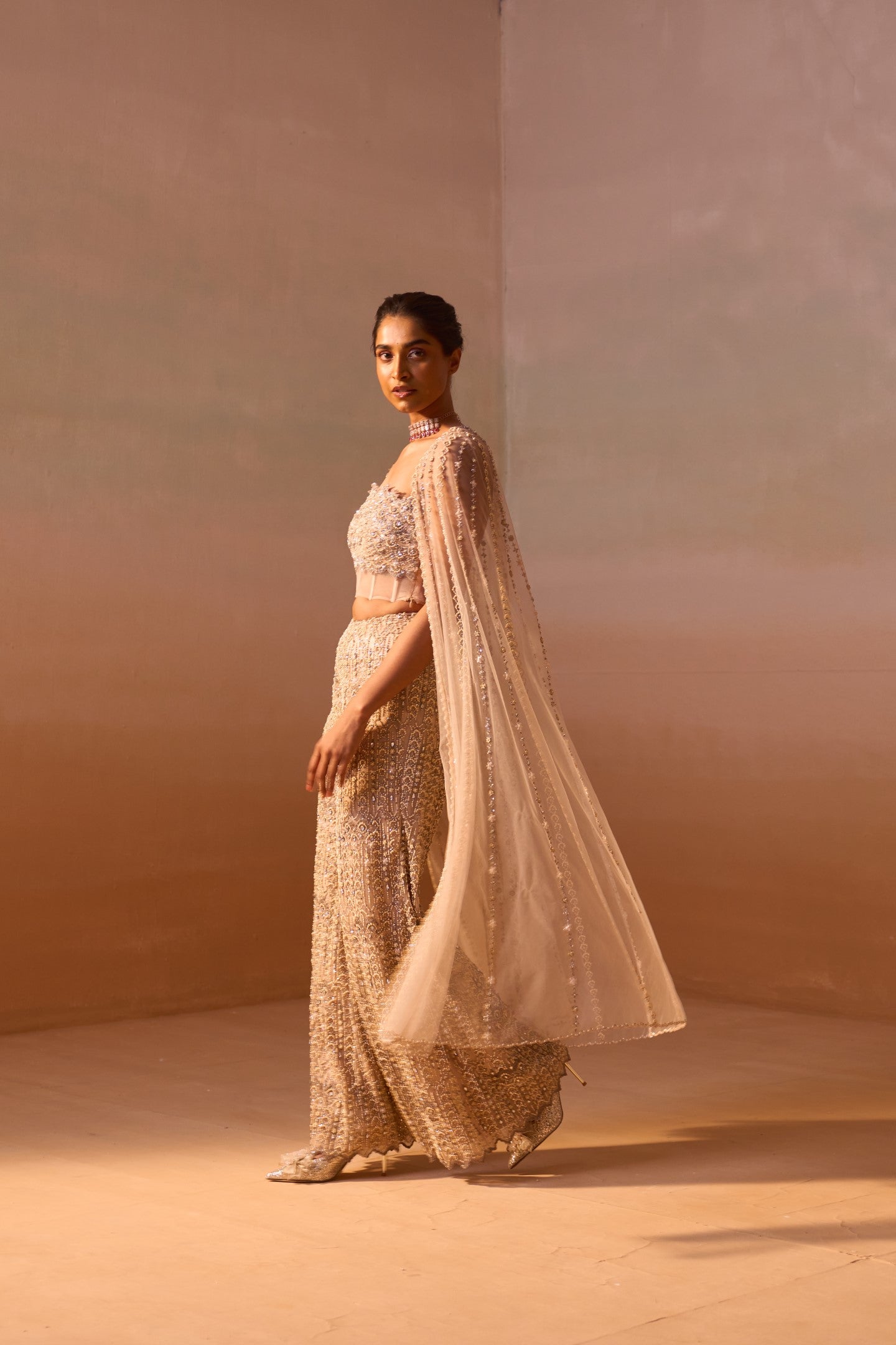 Nude Peach Net Palazzo Set with Pearl Corset and Embroidered Cape