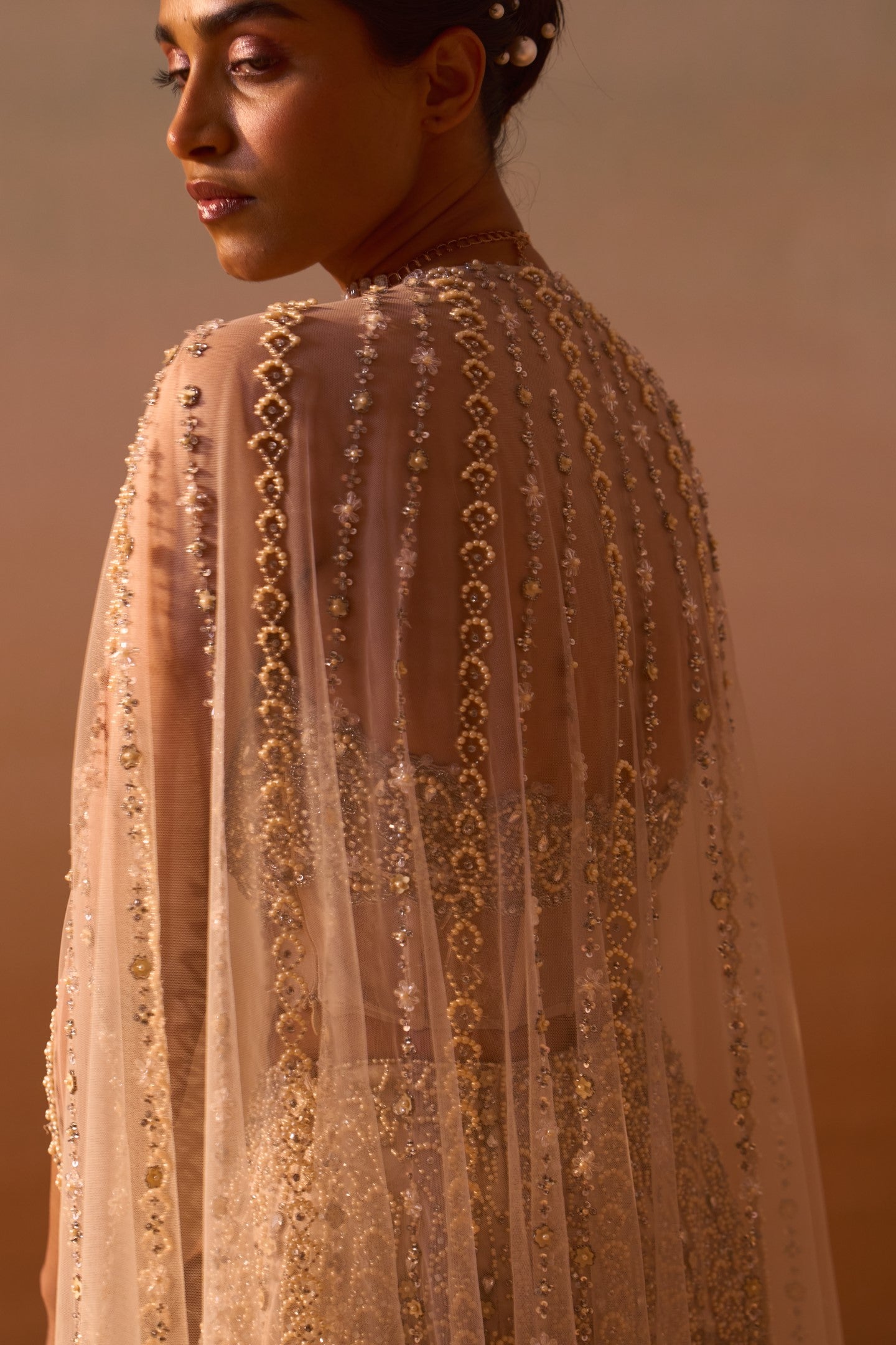Nude Peach Net Palazzo Set with Pearl Corset and Embroidered Cape
