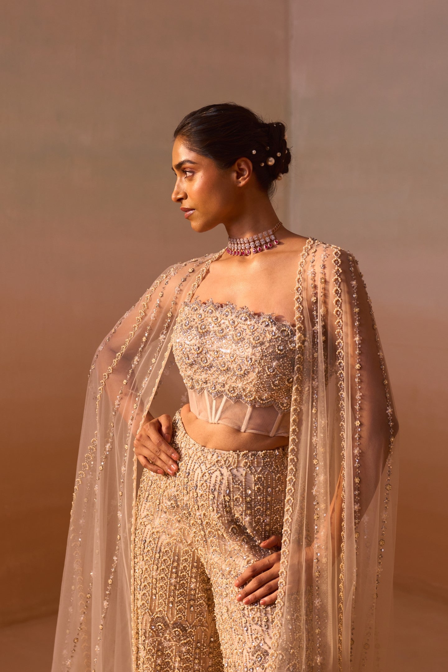 Nude Peach Net Palazzo Set with Pearl Corset and Embroidered Cape