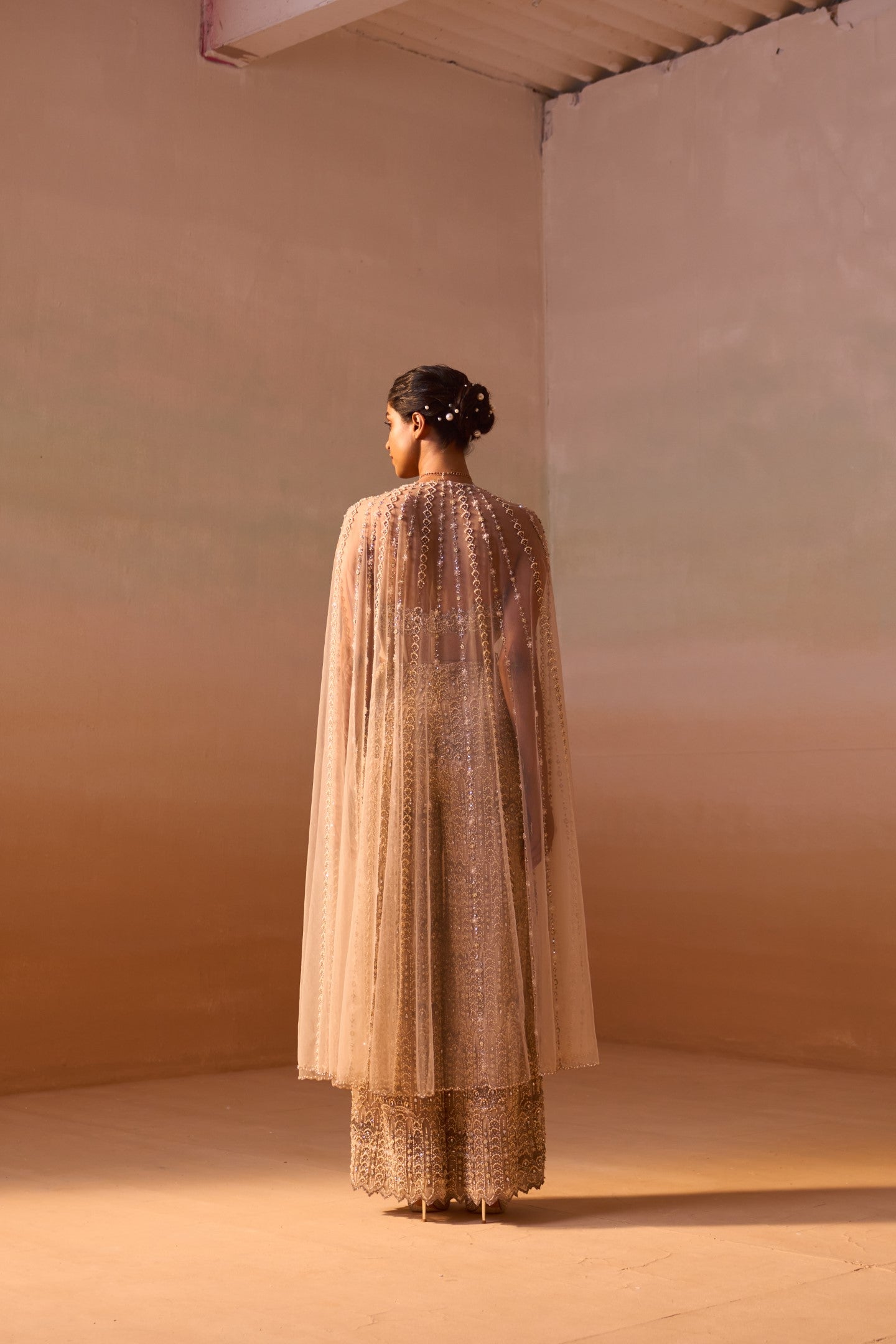Nude Peach Net Palazzo Set with Pearl Corset and Embroidered Cape