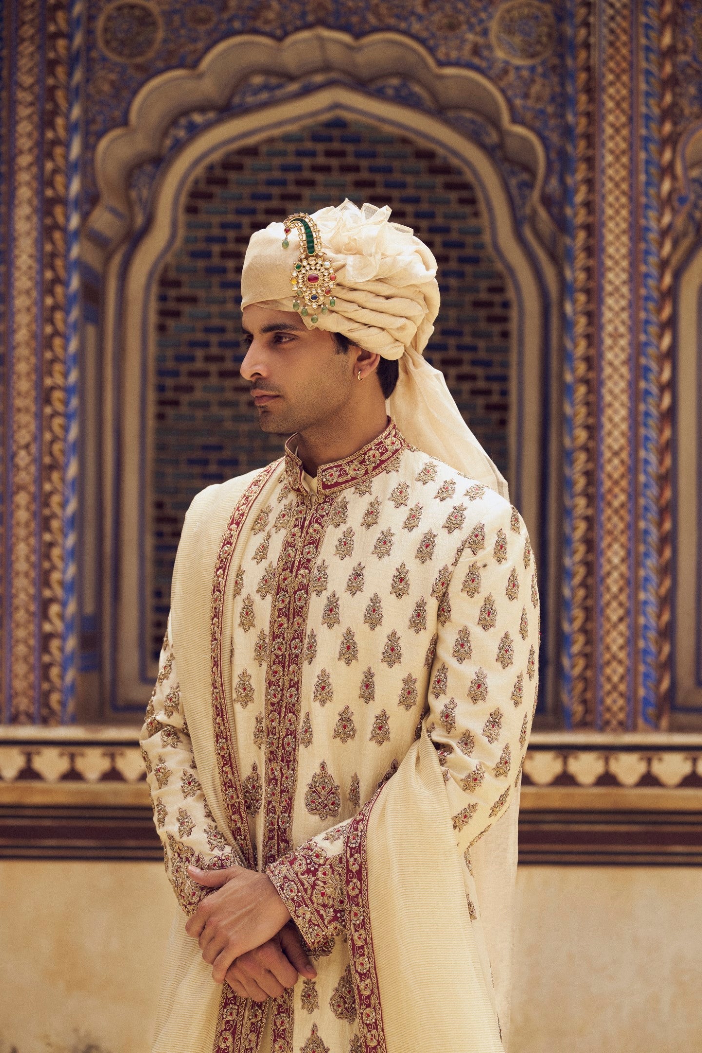 BEIGE RAW SILK SHERWANI WITH A COTTON SILK CHOGA AND CHURIDAR