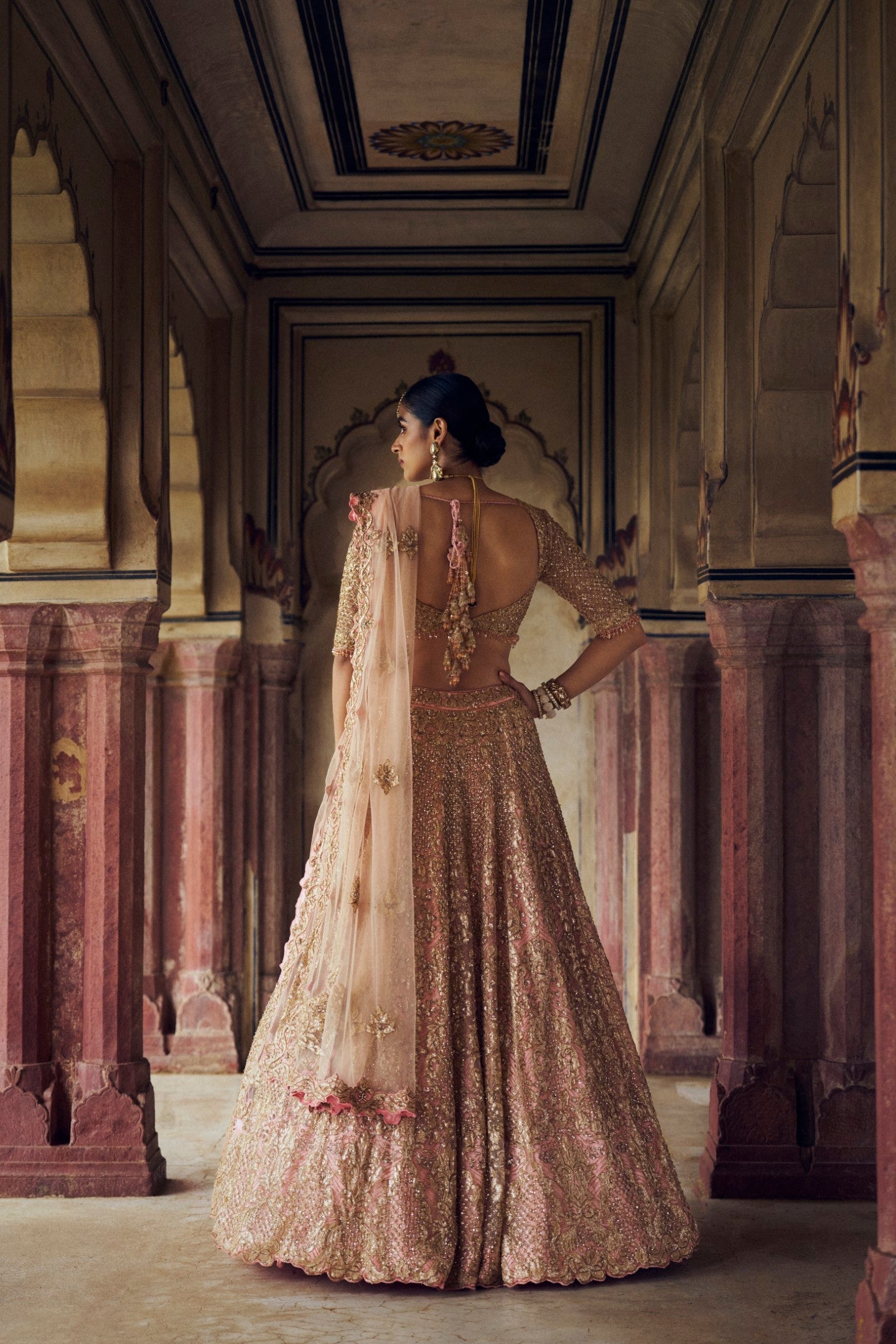 Peach Tulle Lehenga Choli with Gold Applique for Weddings