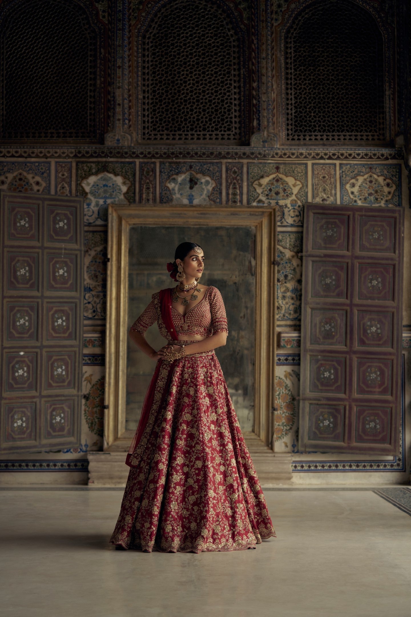 Deep Red Raw Silk Bridal Lehenga Choli with Antique Kasab Work
