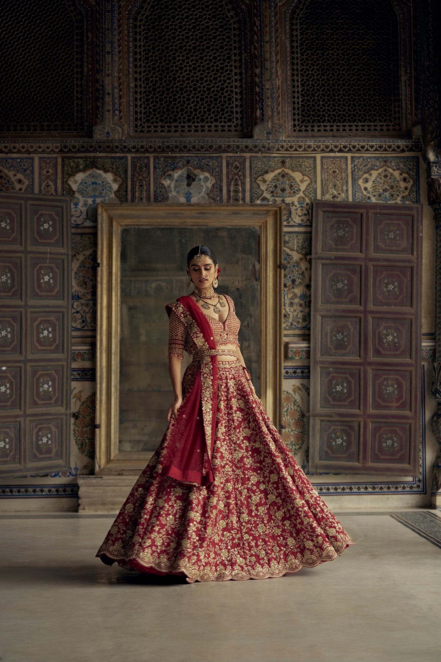 Deep Red Raw Silk Bridal Lehenga Choli with Antique Kasab Work