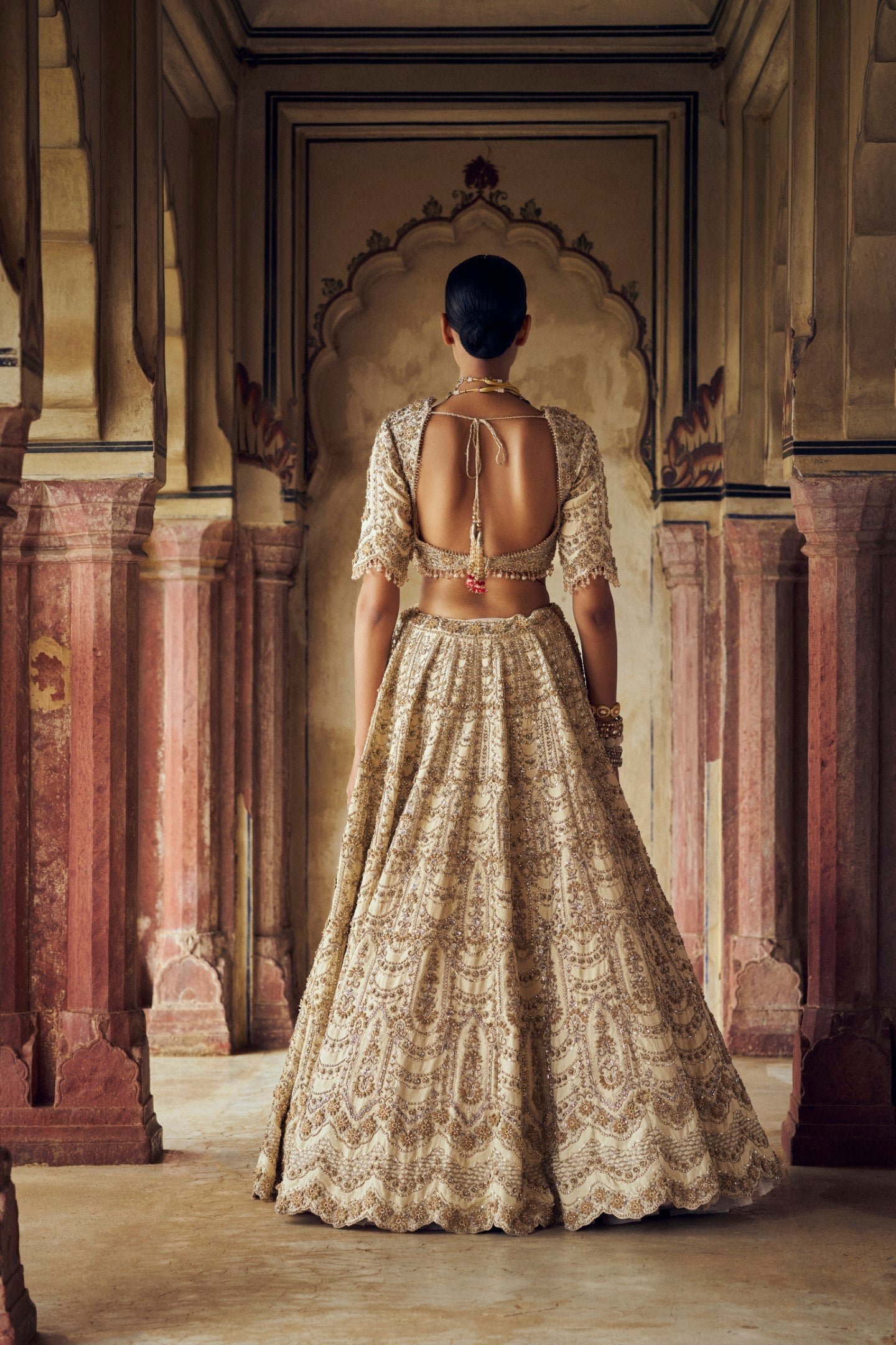 Gold Raw Silk Lehenga Choli with 3-D Embroidered Net Dupatta